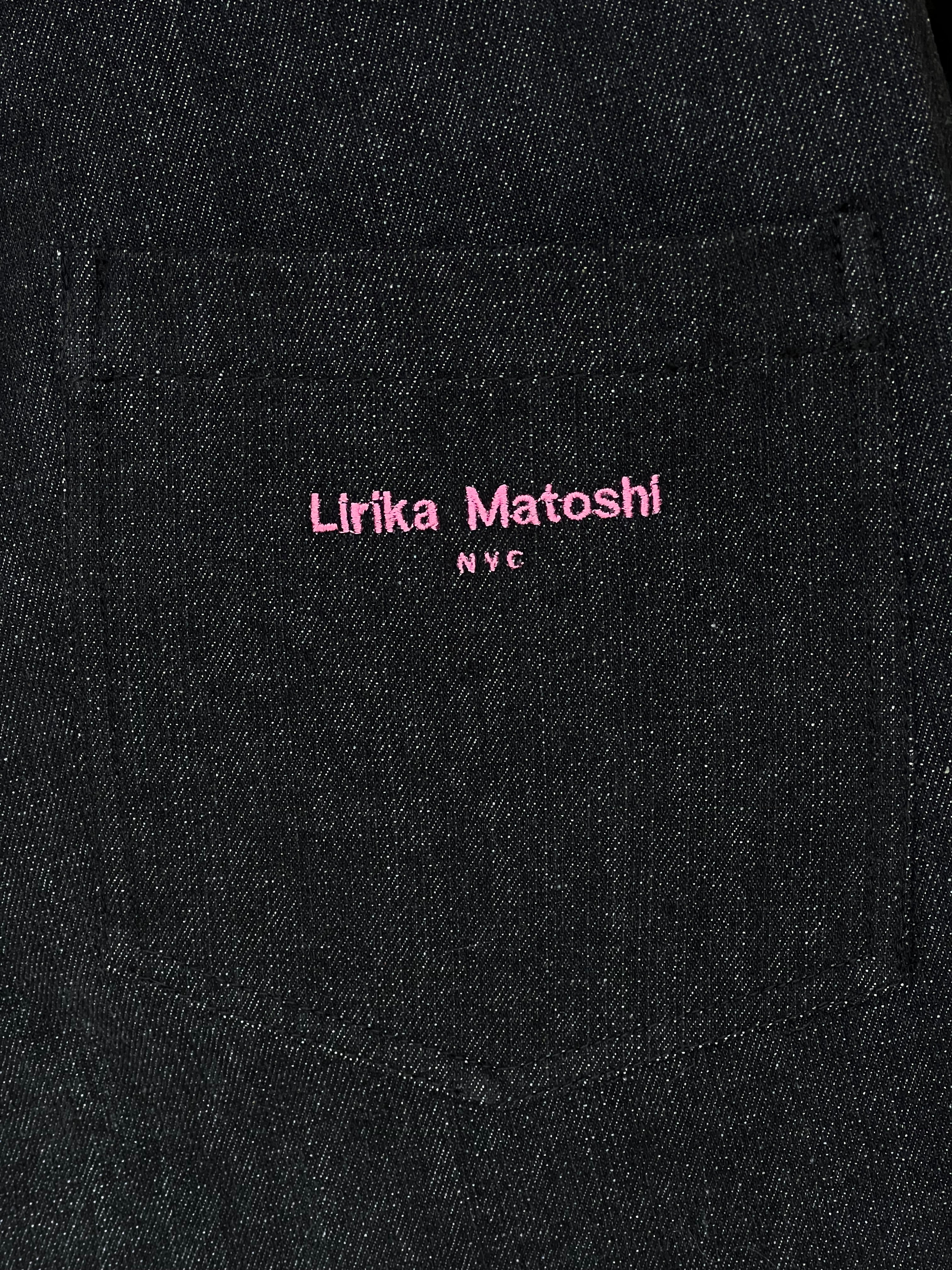 Black denim pants with colorful hoops