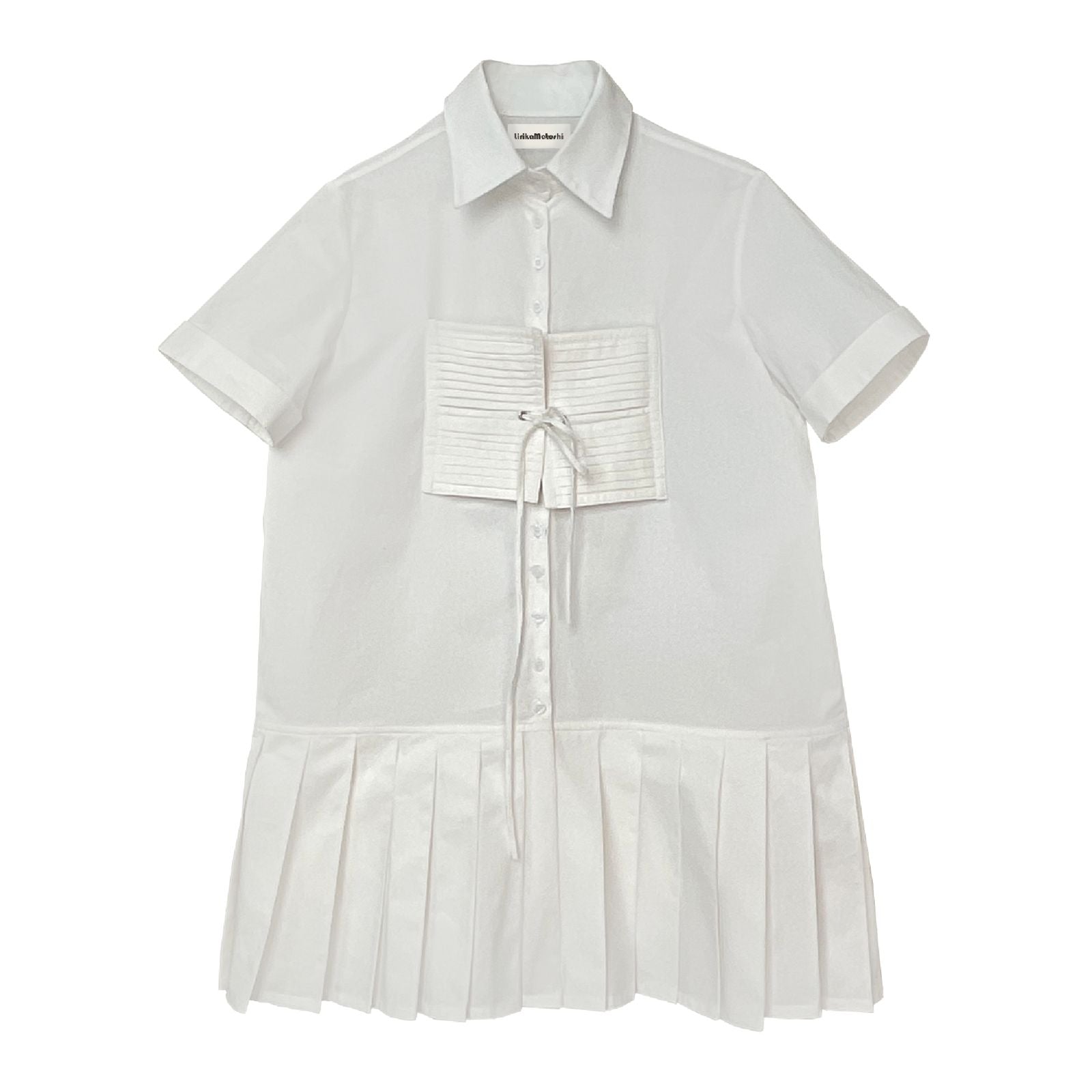 A white, short-sleeved button-up dress with a pleated skirt and a bow detail at the chest.