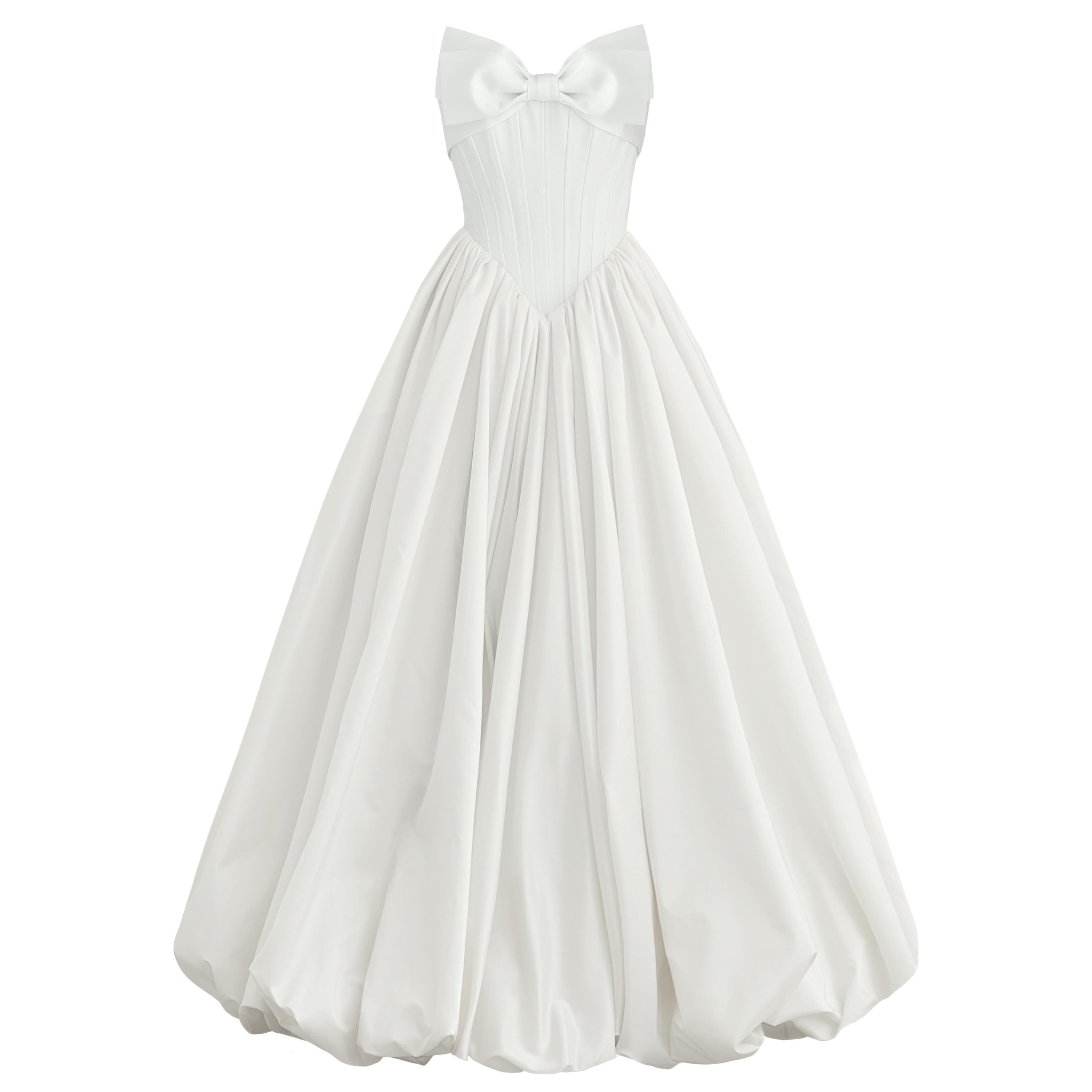 White A-Line maxi dress with a large embroidered bow