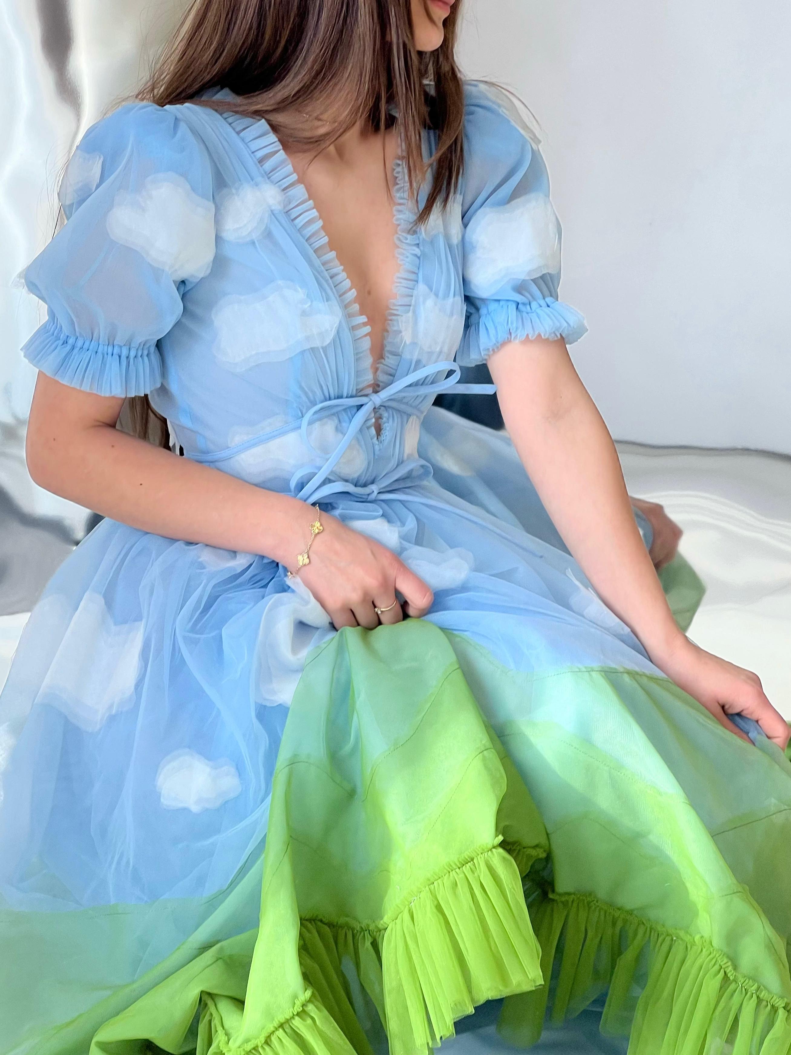 Blue and green midi dress made from tulle, with v-neck, short sleeves and cloud design