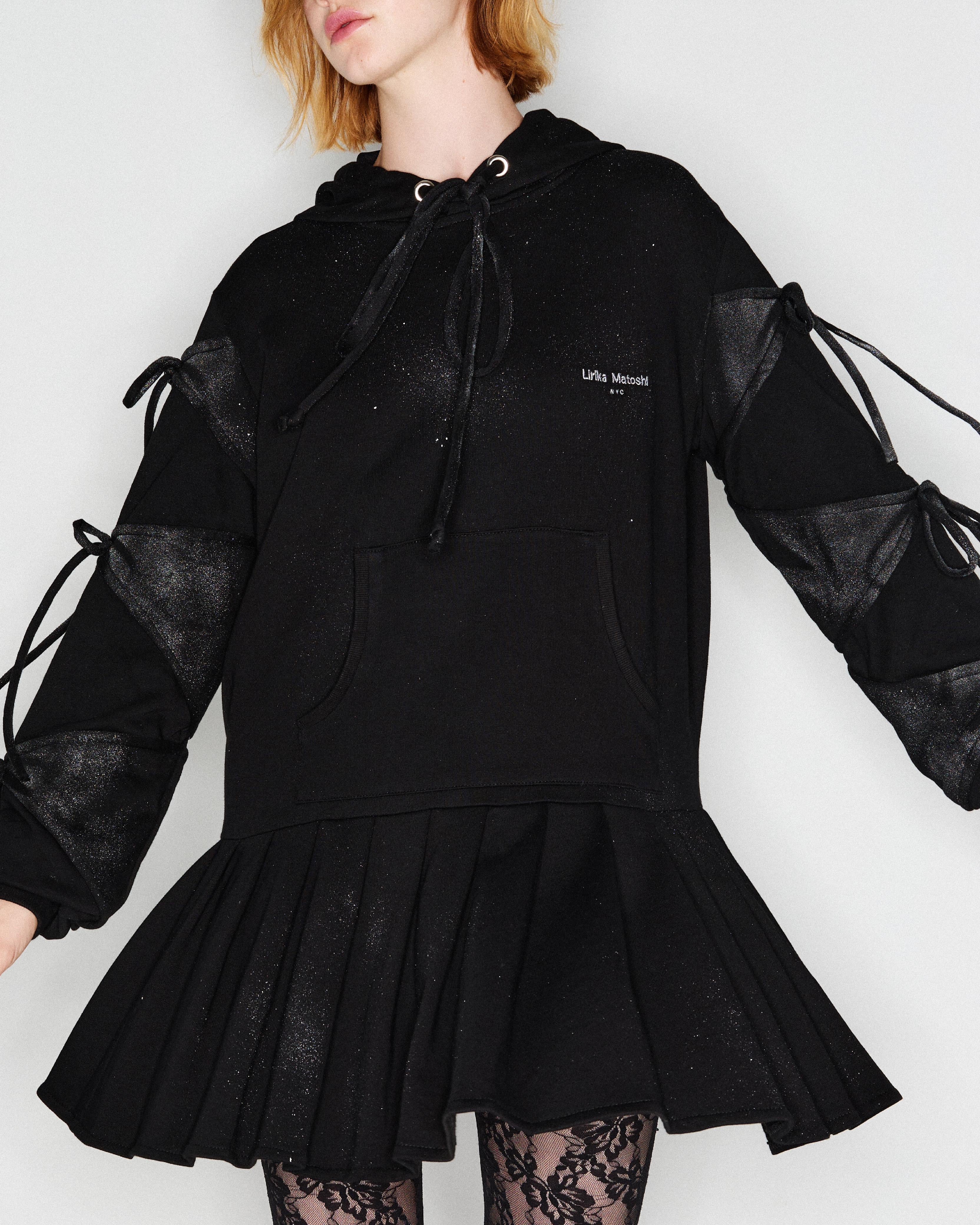 black sweatshirt dress with bows and long sleeves