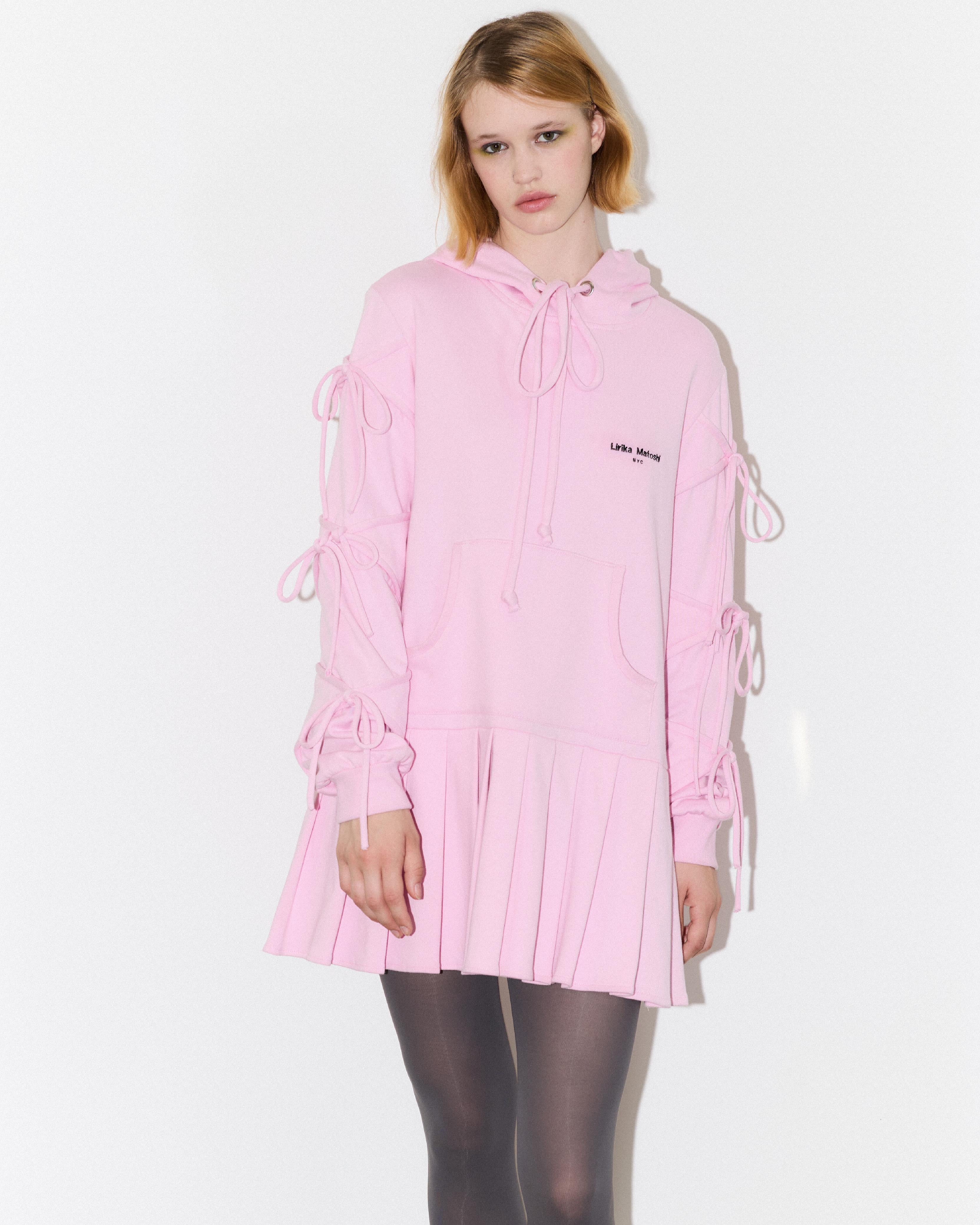 pink sweatshirt dress with bows and long sleeves