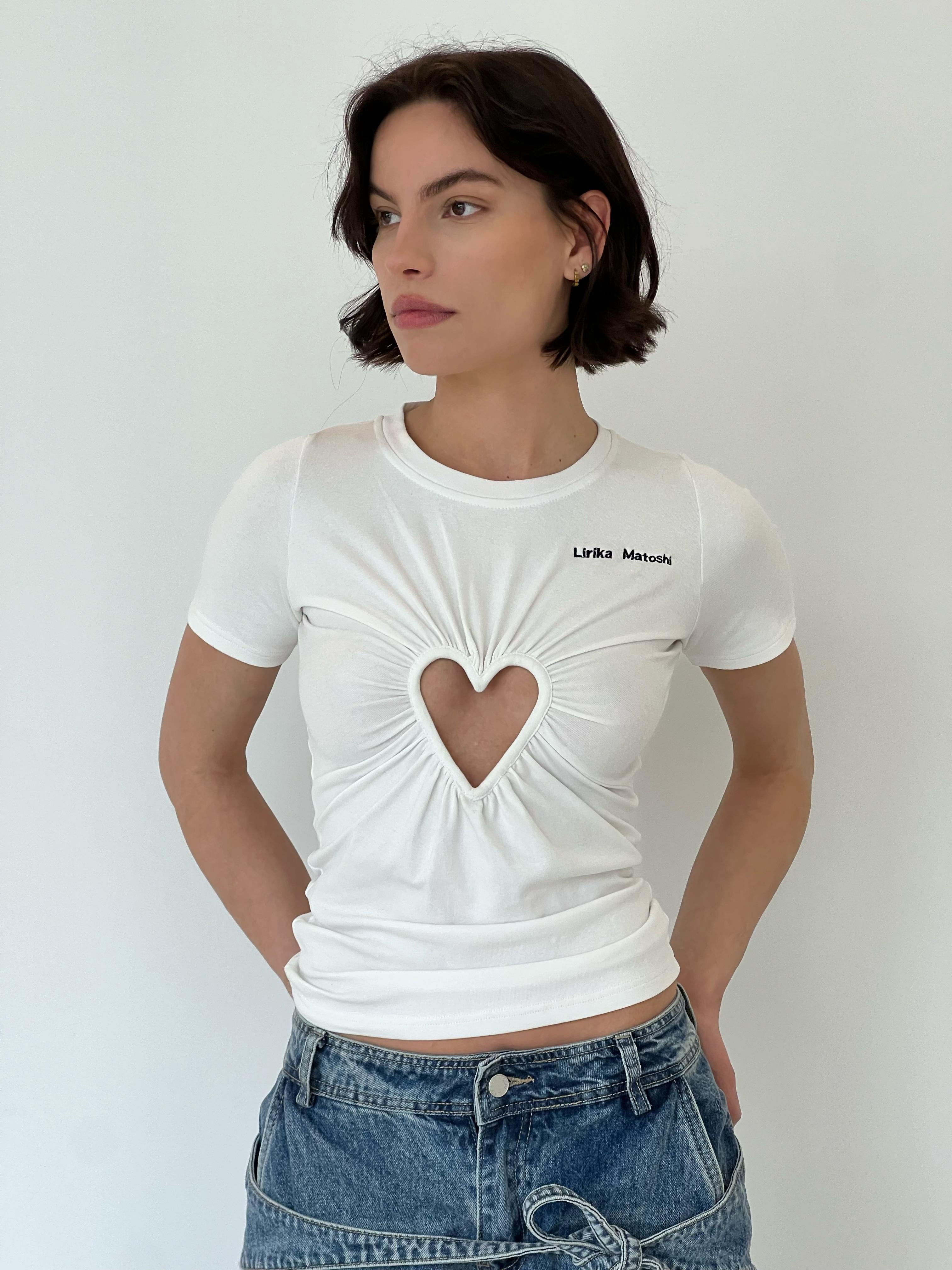 White t-shirt with a heart design and embroidered logo brand
