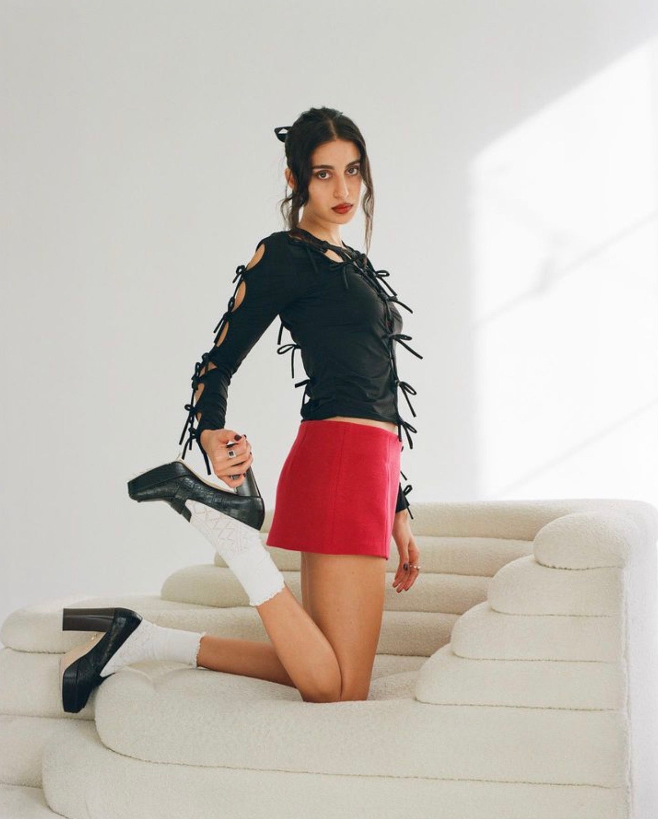 top made from spandex with red bows