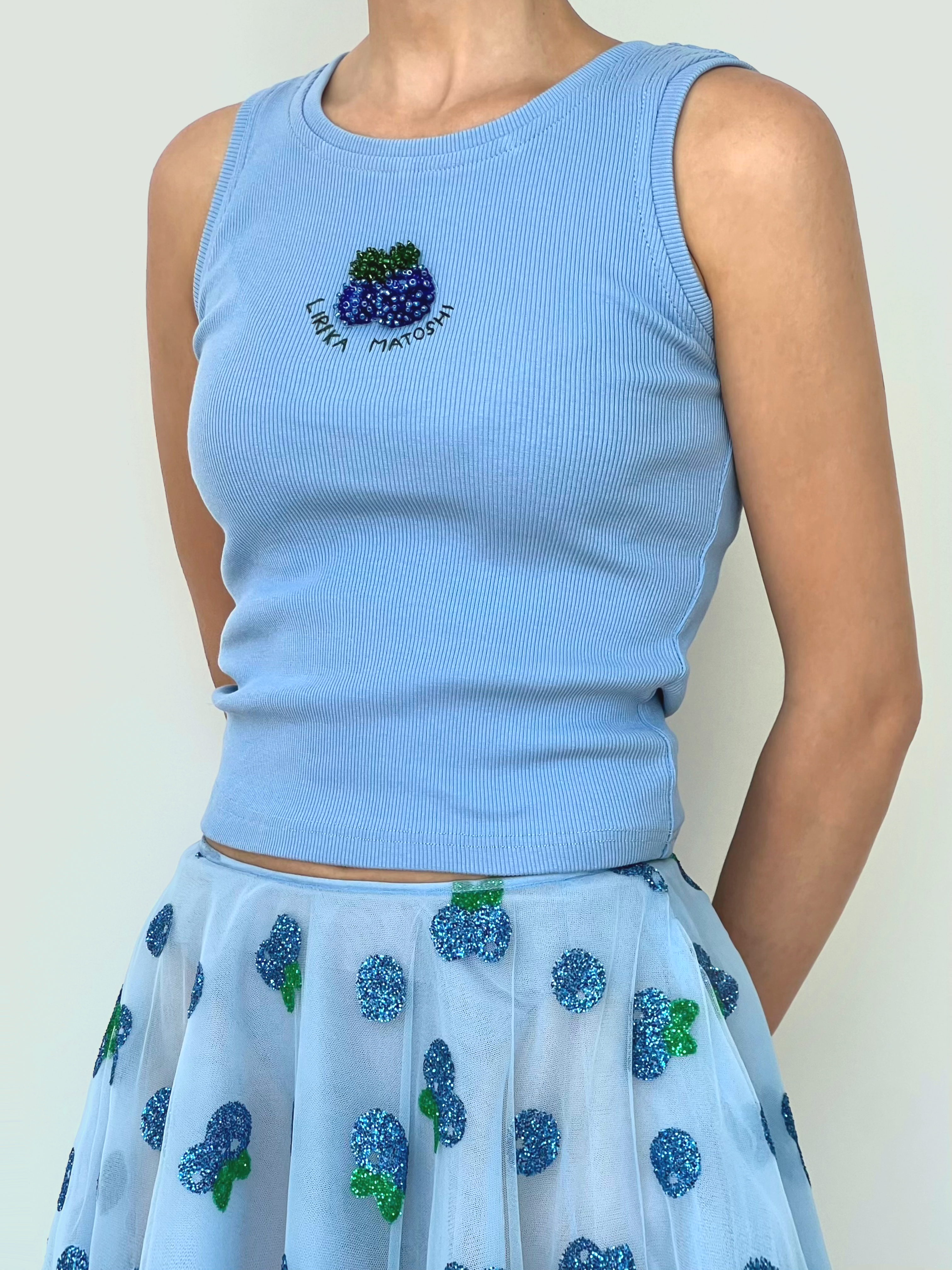 Blue tank top with blueberry design and text