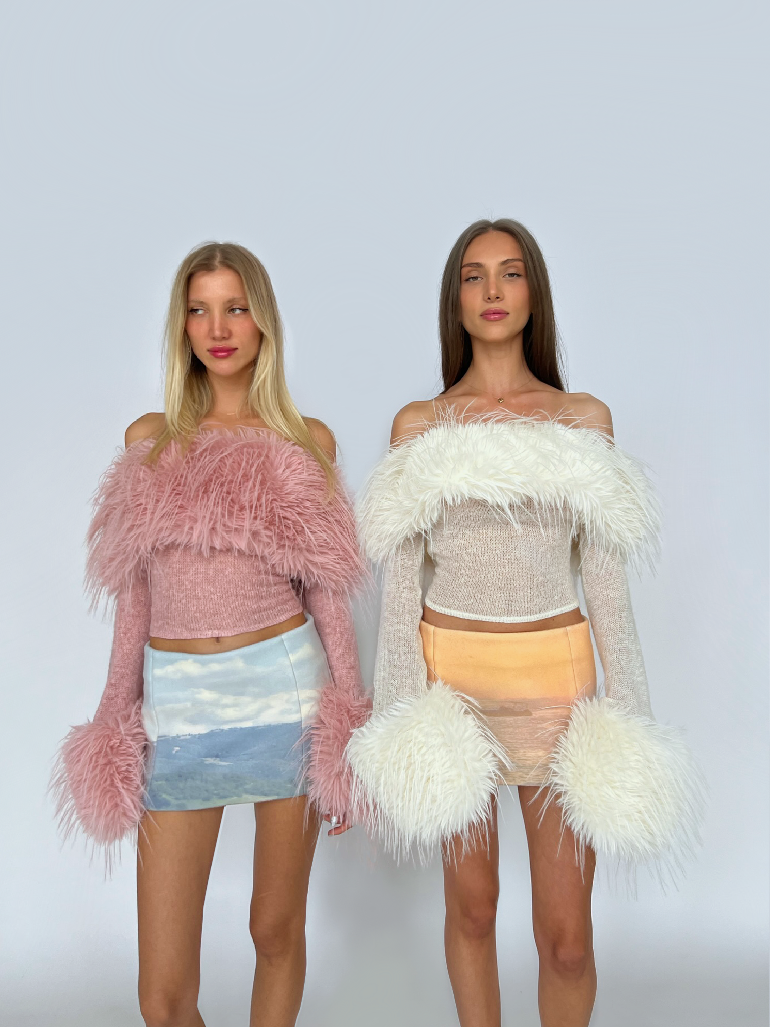 White sweater with fur and long sleeves