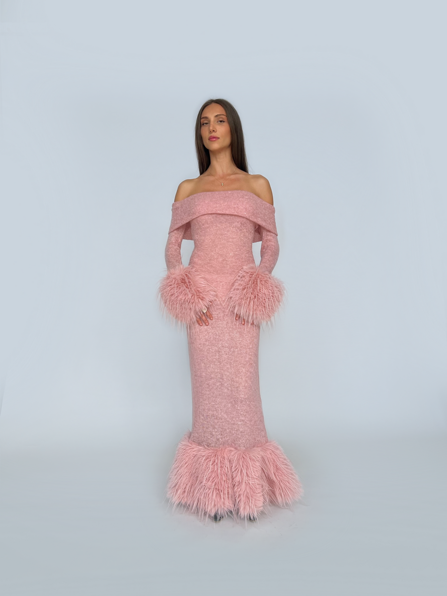 Pink sheath dress with fur and long off the shoulder sleeves