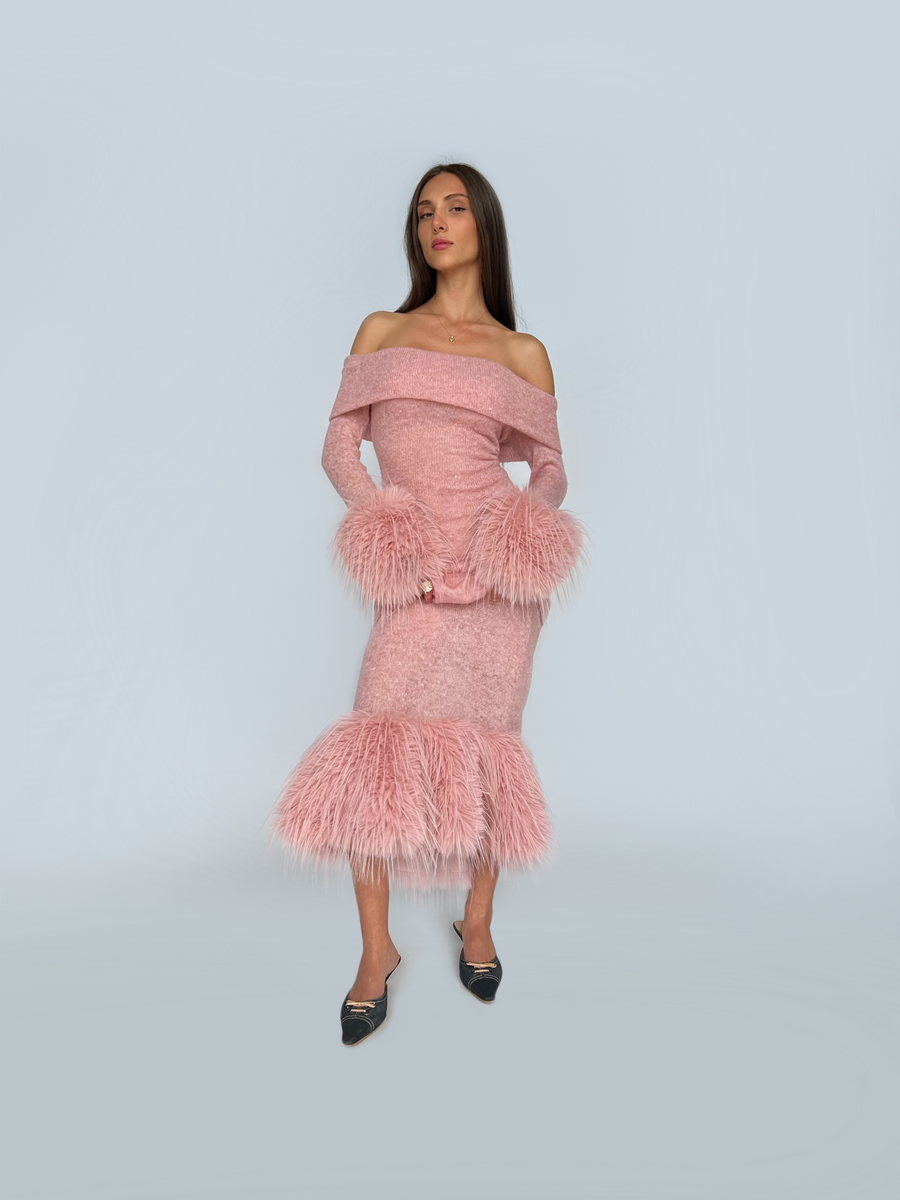 Pink sheath dress with fur and long off the shoulder sleeves