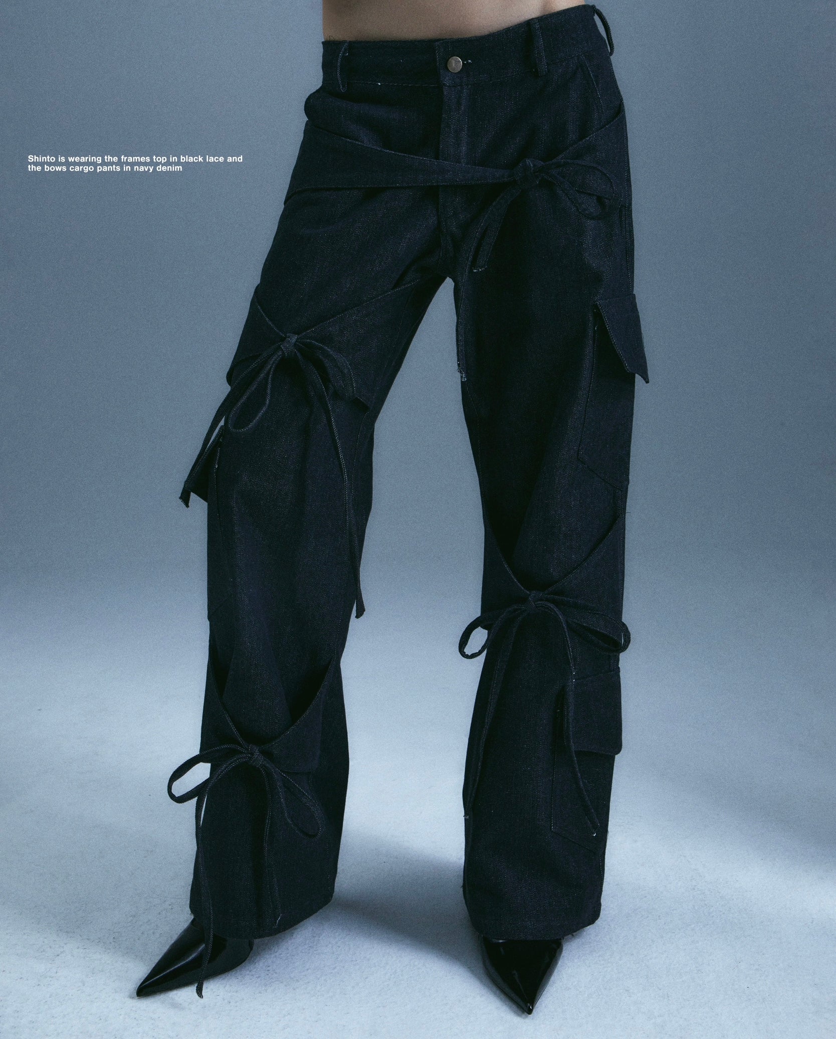 Black denim pants with bows