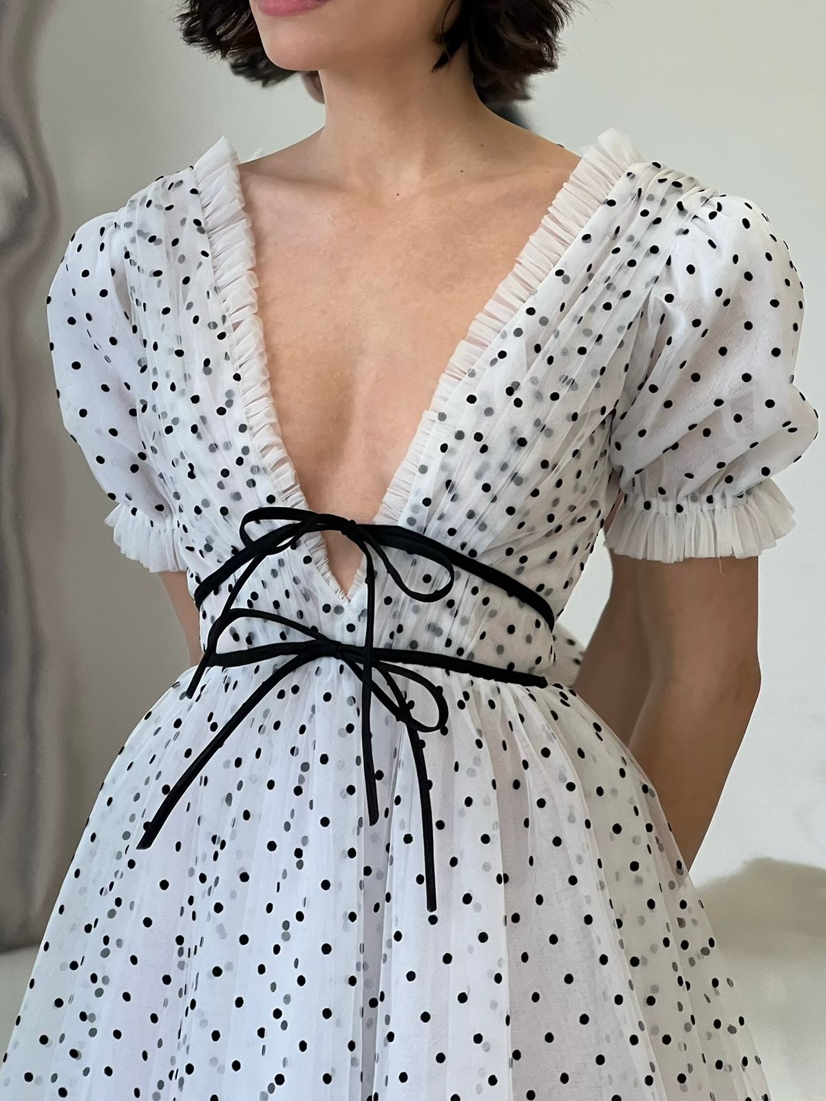 white tulle midi dress with black polka dots