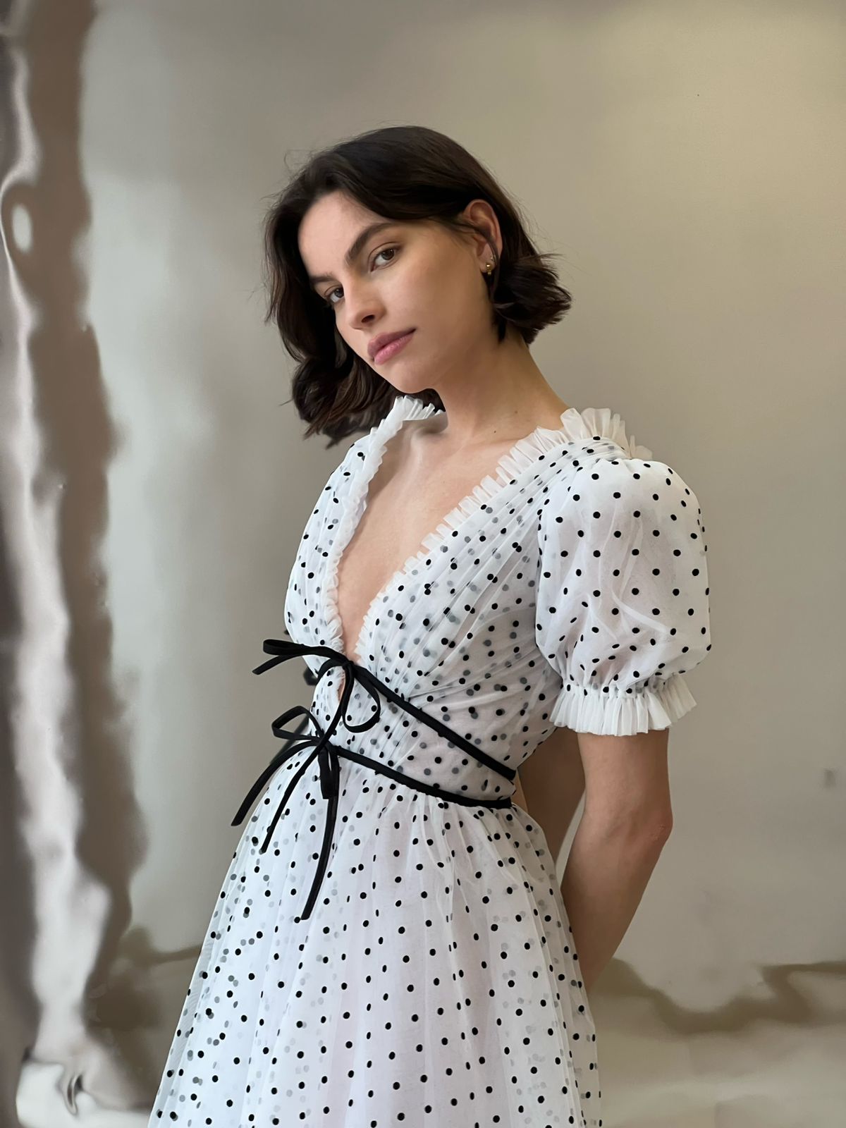 white tulle midi dress with black polka dots