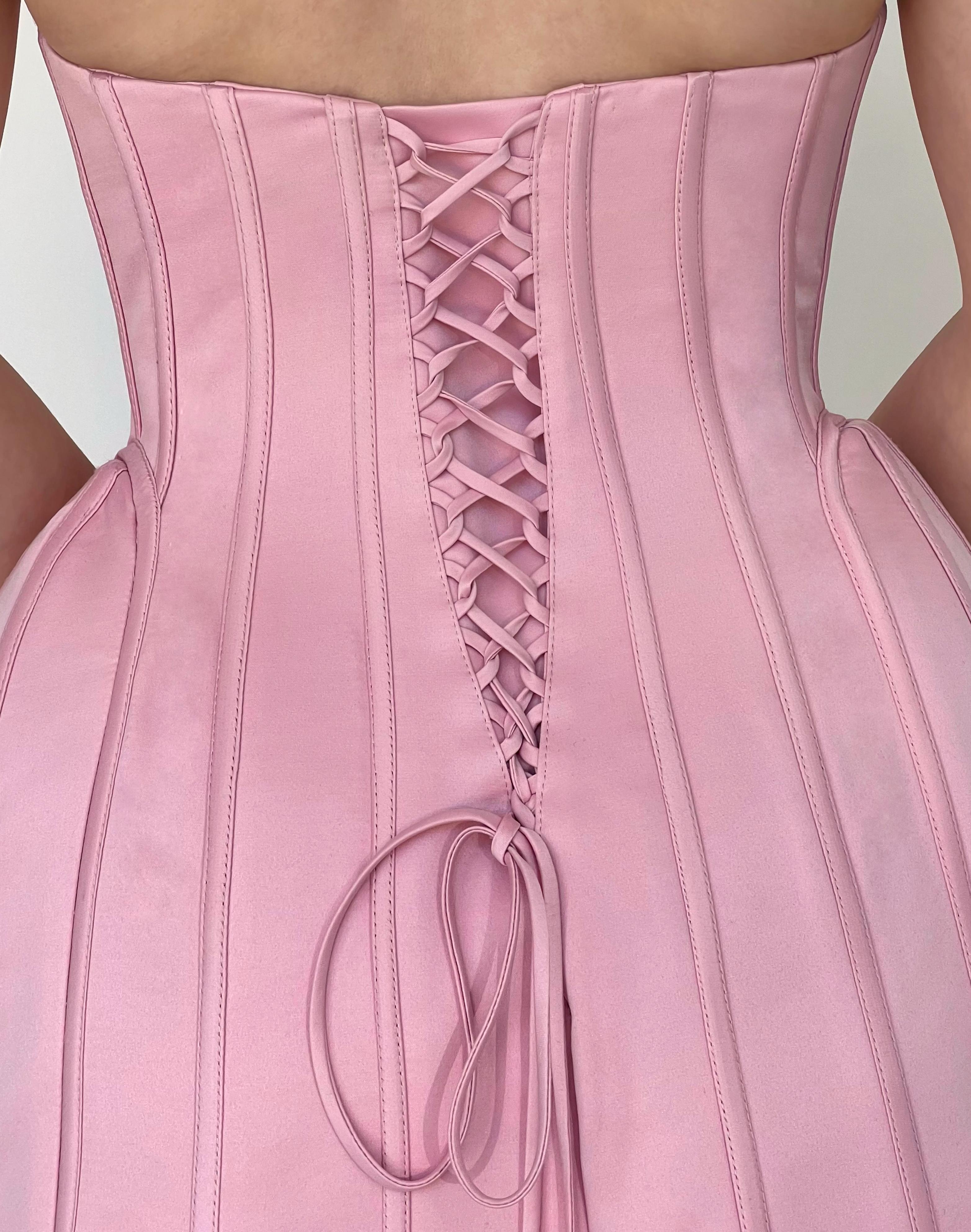 Pink mini dress with embroidered figures