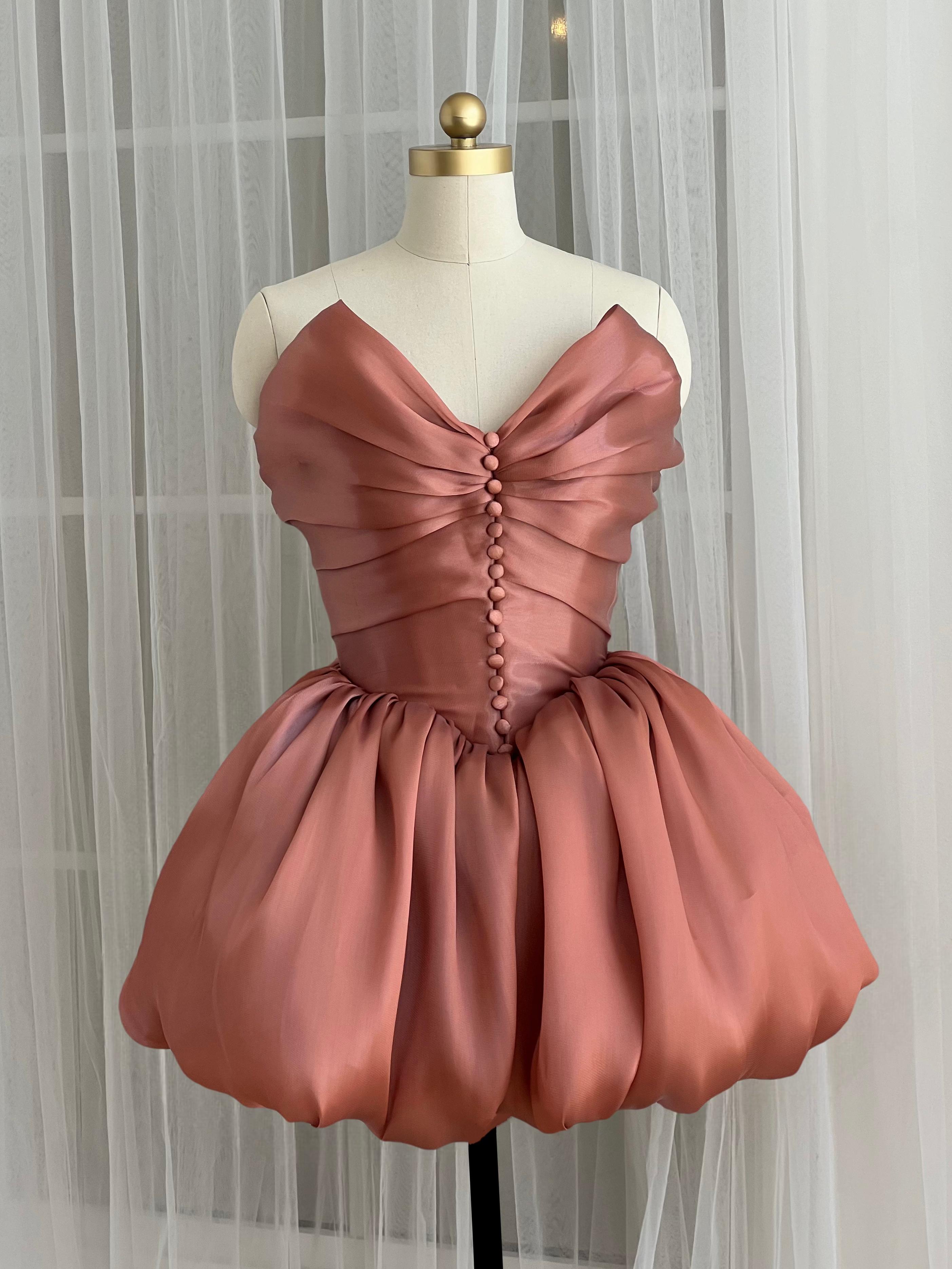 Pink mini dress with ruffles
