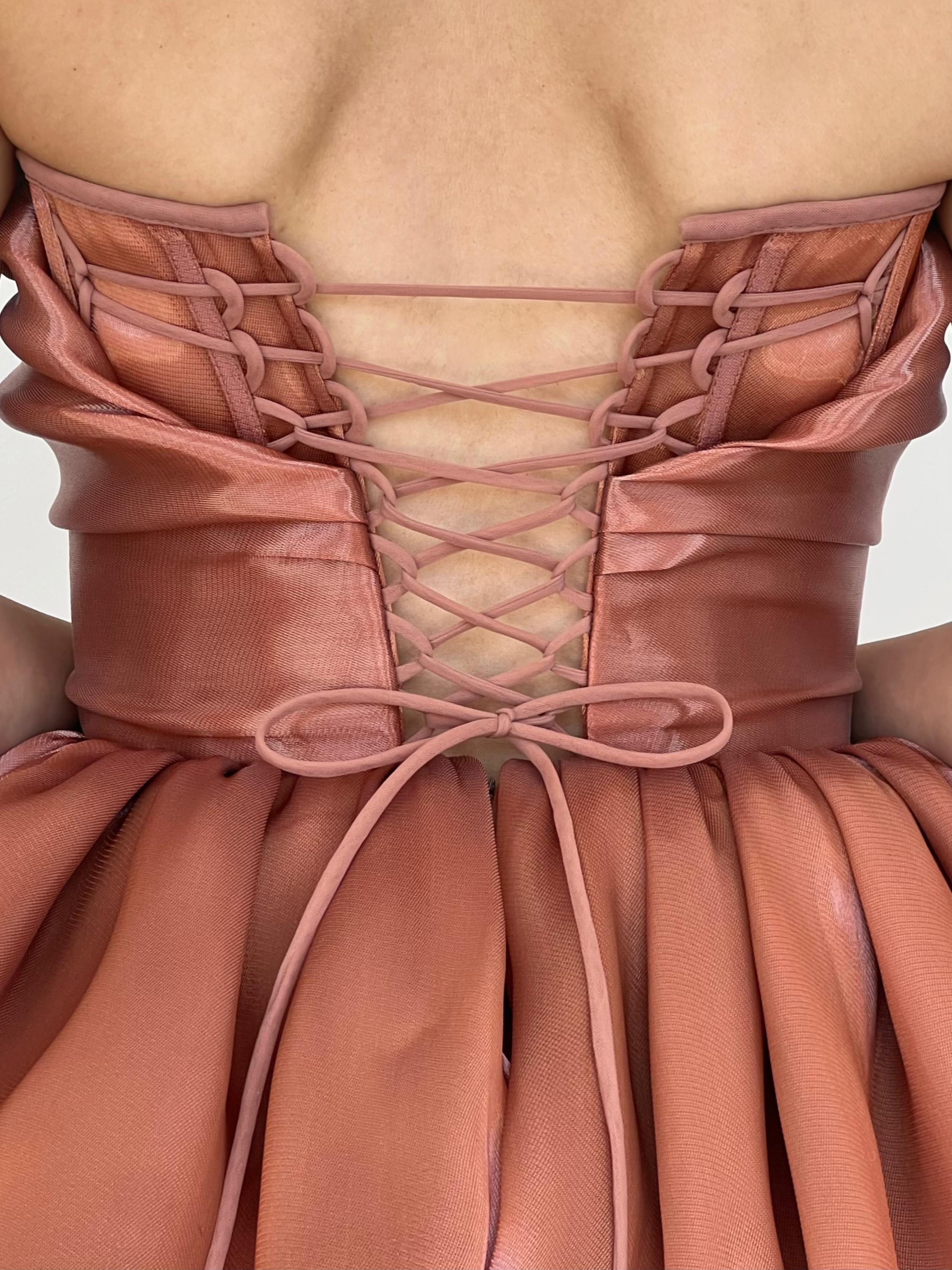 Pink mini dress with ruffles