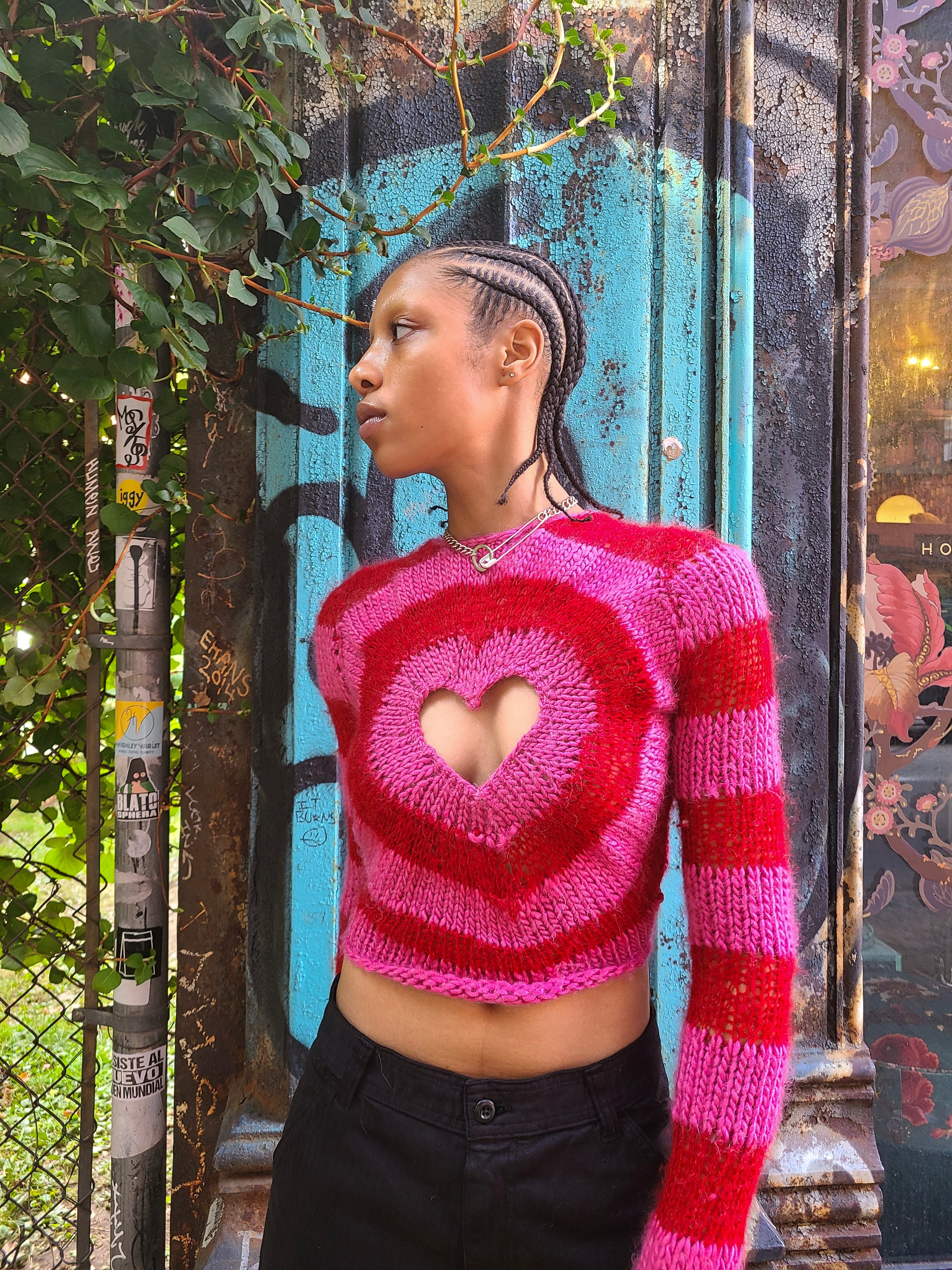 pink and red hand knitted heart sweater
