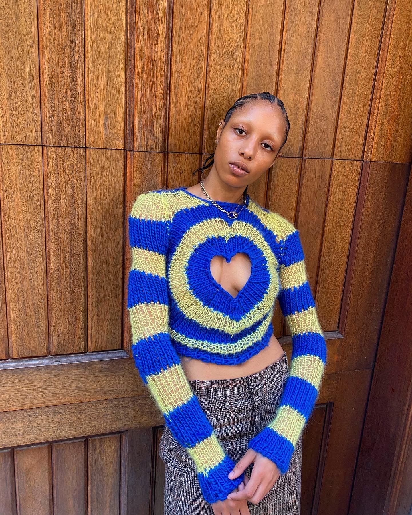blue and yellow hand knitted heart sweater