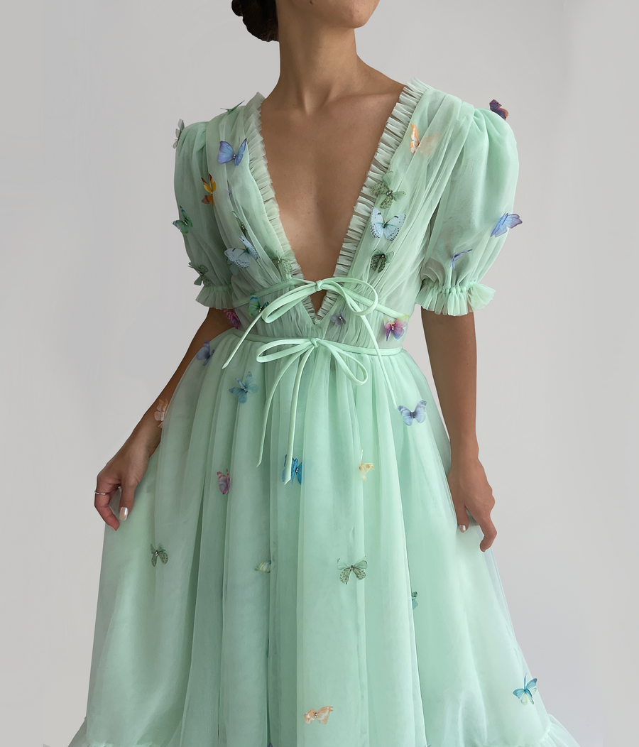 Green midi dress with embroidered butterflies, short sleeves and v-neck