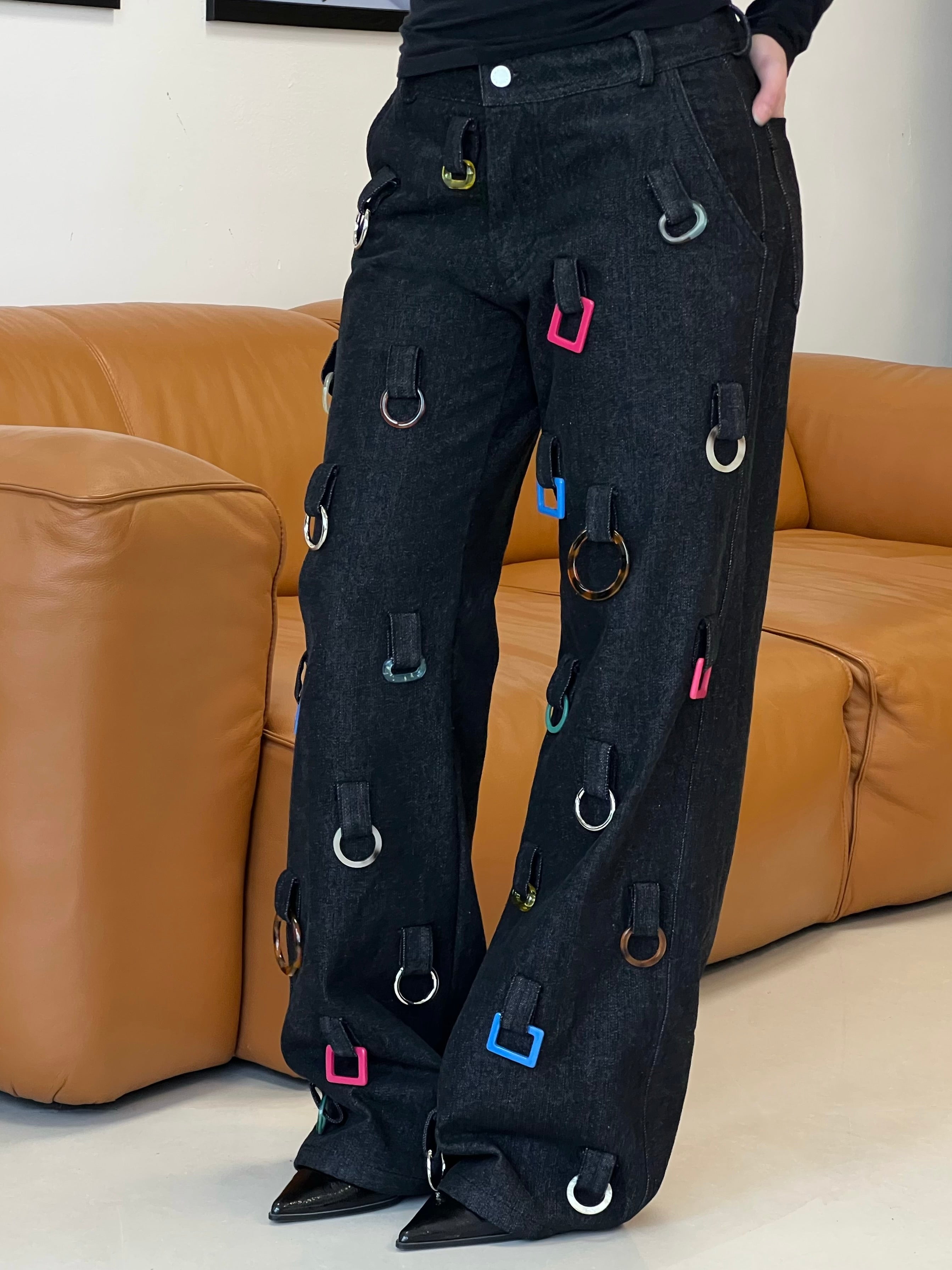 Black denim pants with colorful hoops