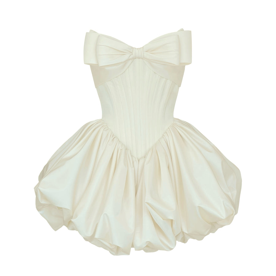 White mini dress with an embroidered bow detail