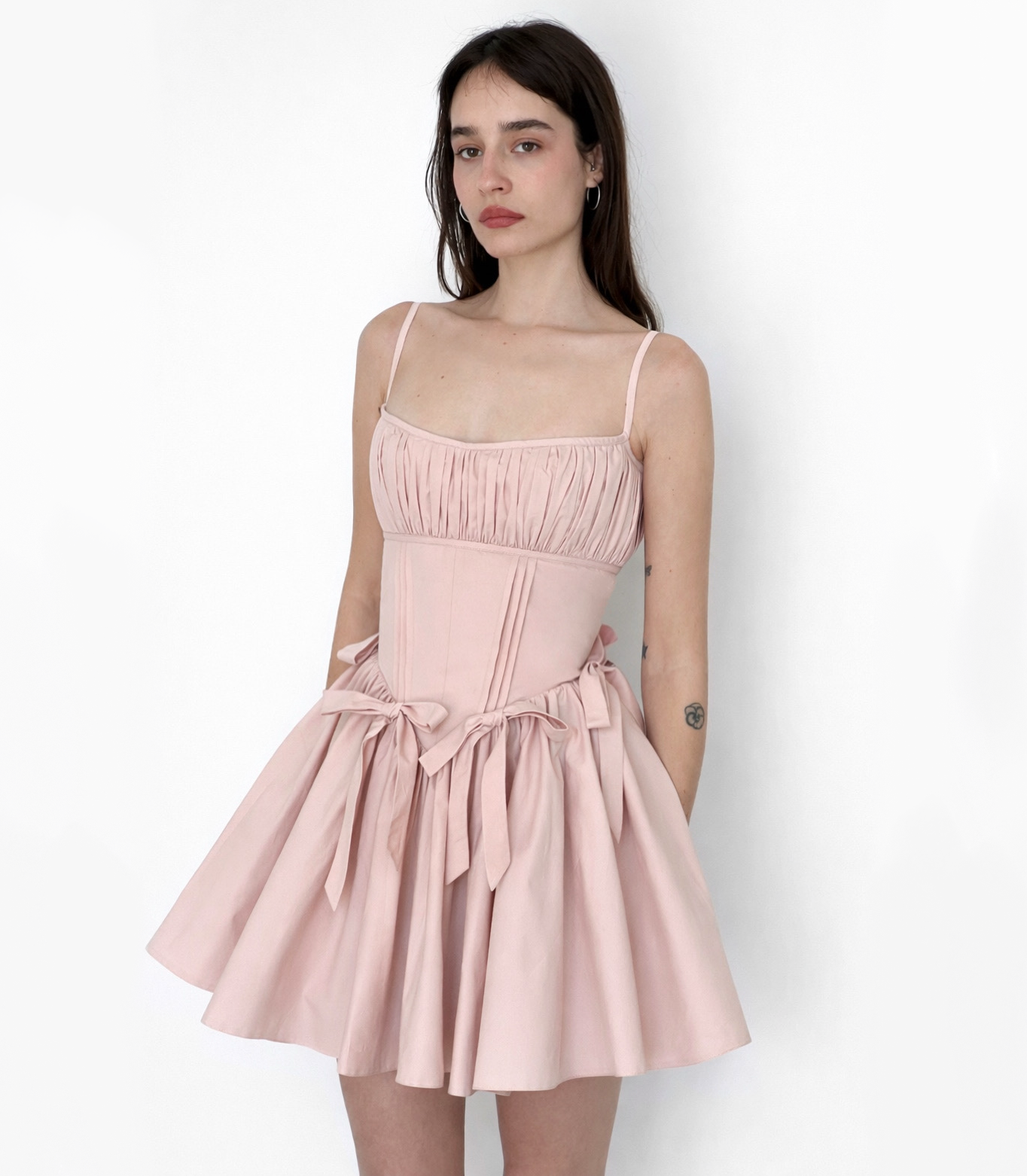 Pink mini dress with straps and embroidered bows