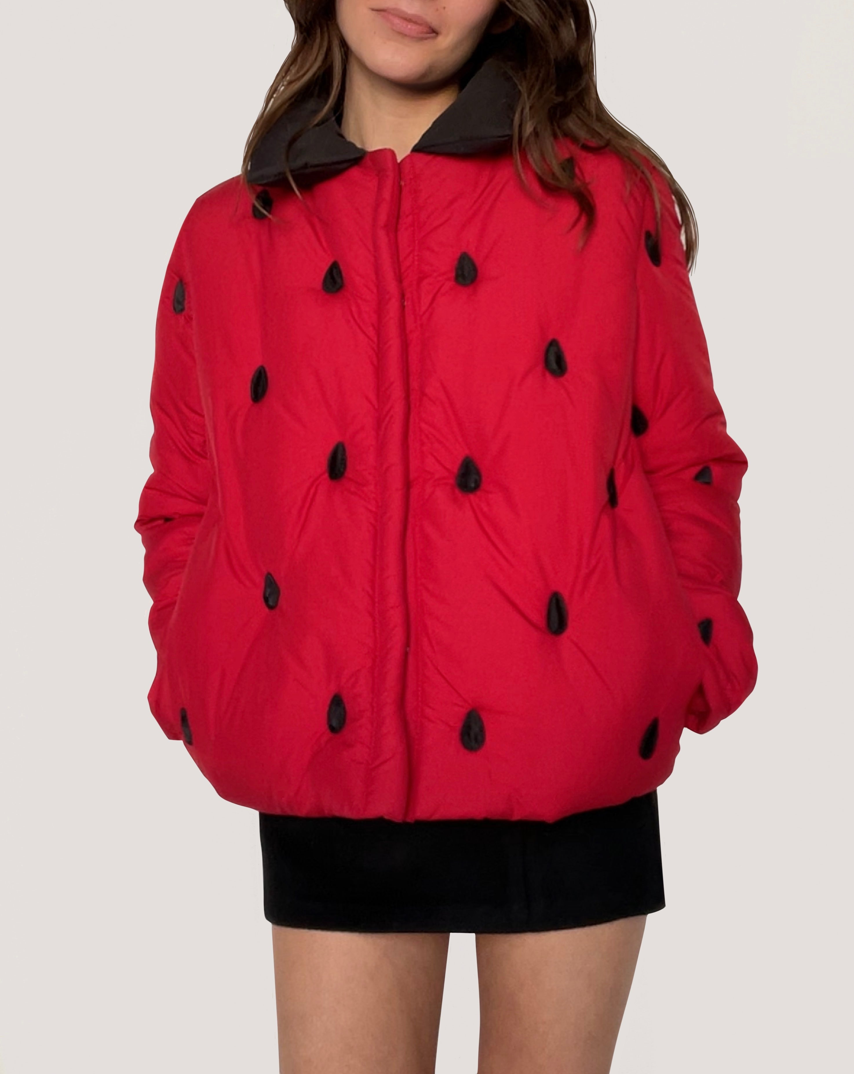 Red puffer jacket with strawberry design