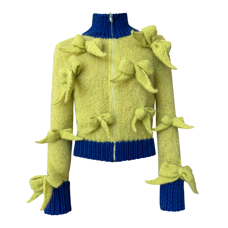 Yellow knitted sweater with bows