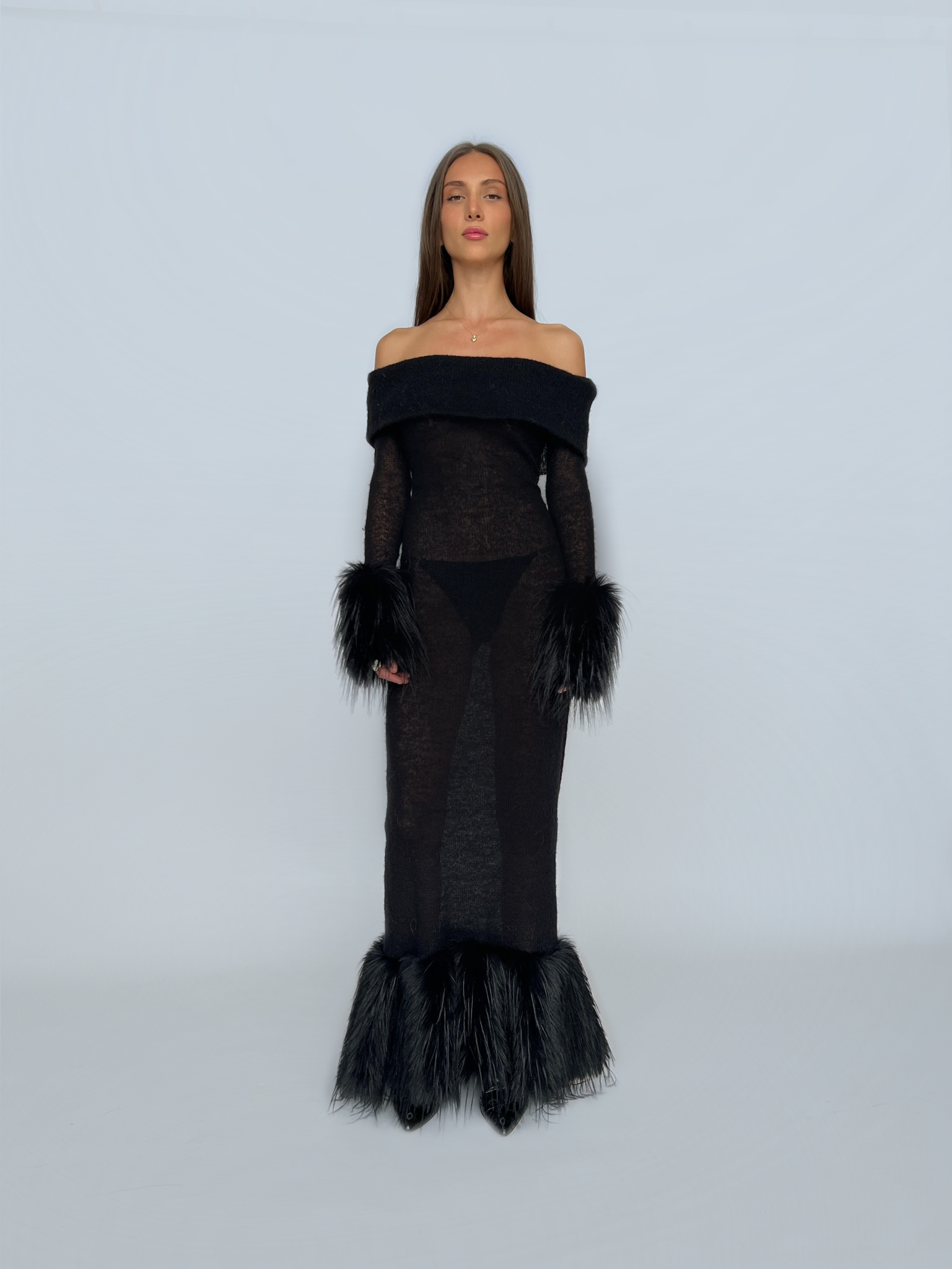 Black sheath dress with fur and long off the shoulder sleeves