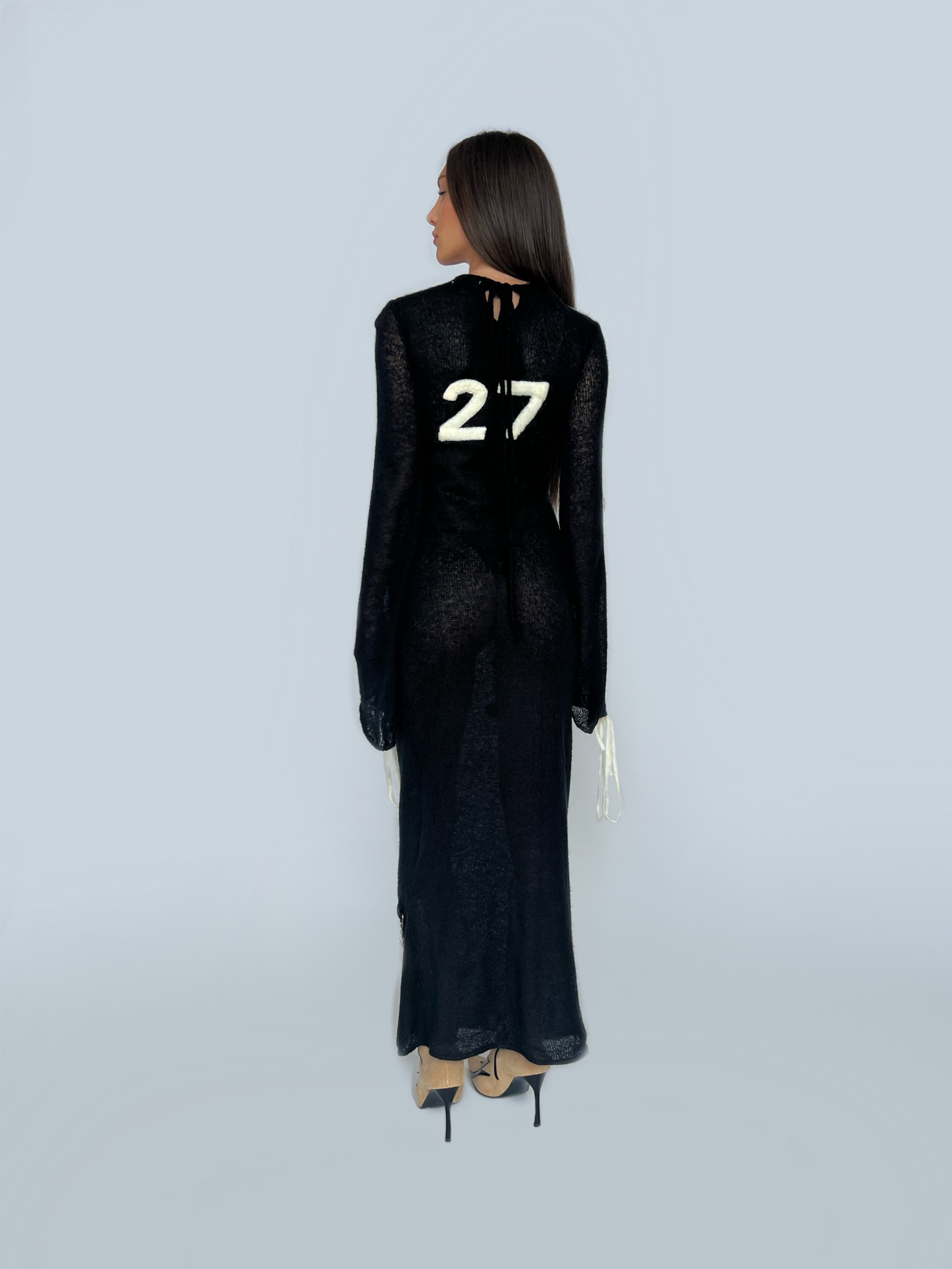 Black sheath dress with long sleeves and vintage keychains