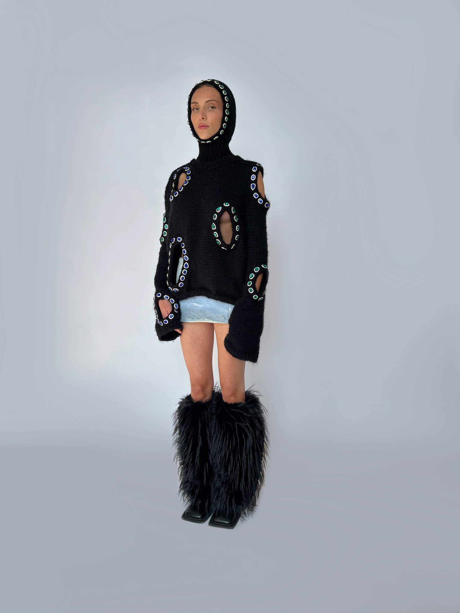 Black knitted sweater with embroidered jewelry, long sleeves and holes