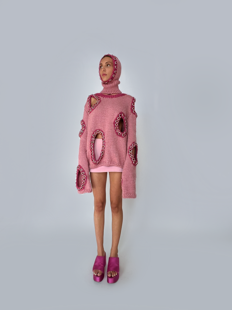 Pink knitted balaclava with embroidered jewelry 