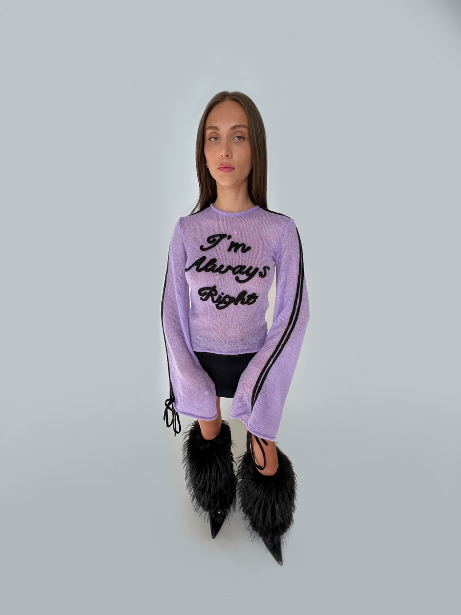 Sweater with 2025 writing on sleeves