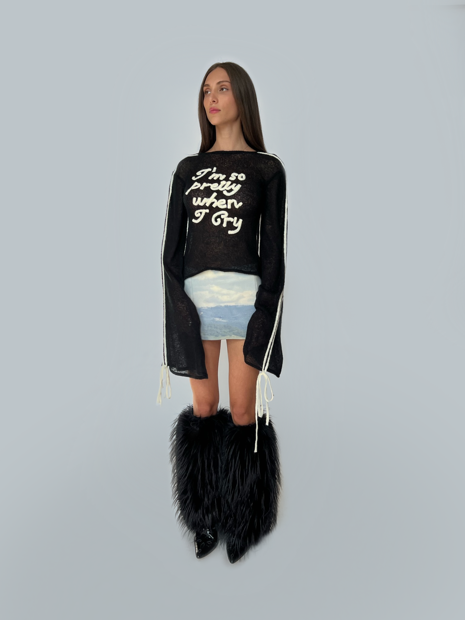 Black sweater with writing and long sleeves