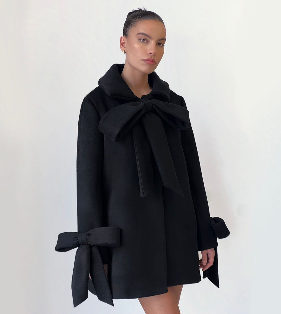 Black coat with bows