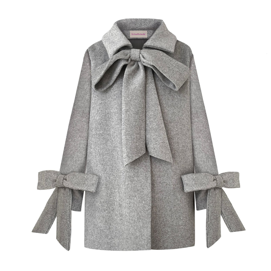 grey coat with bows