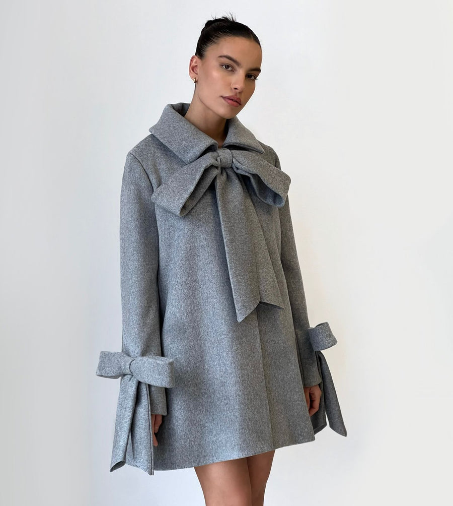 grey coat with bows