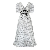 white tulle midi dress with black polka dots