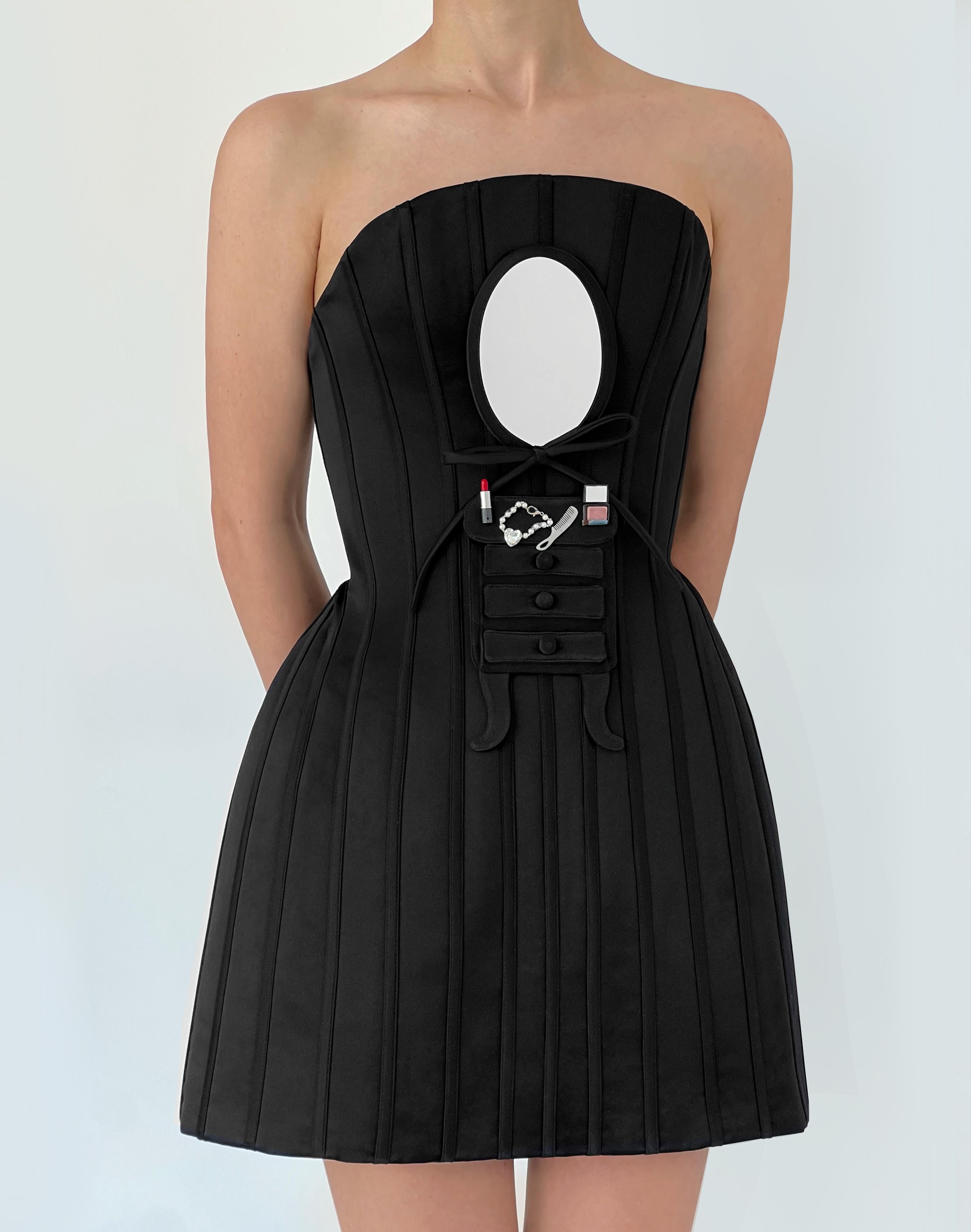 Black mini dress with embroidered figures