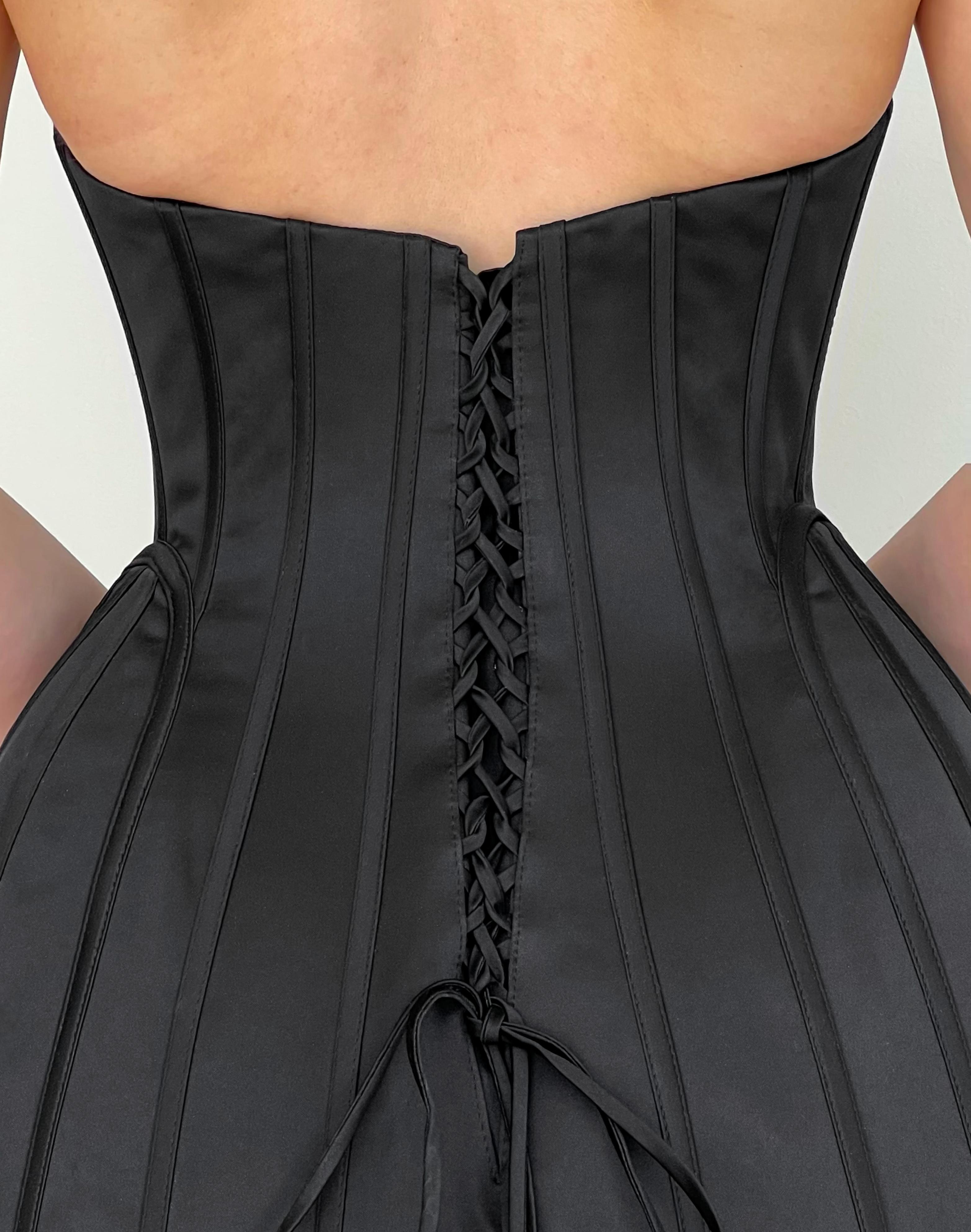 Black mini dress with embroidered figures