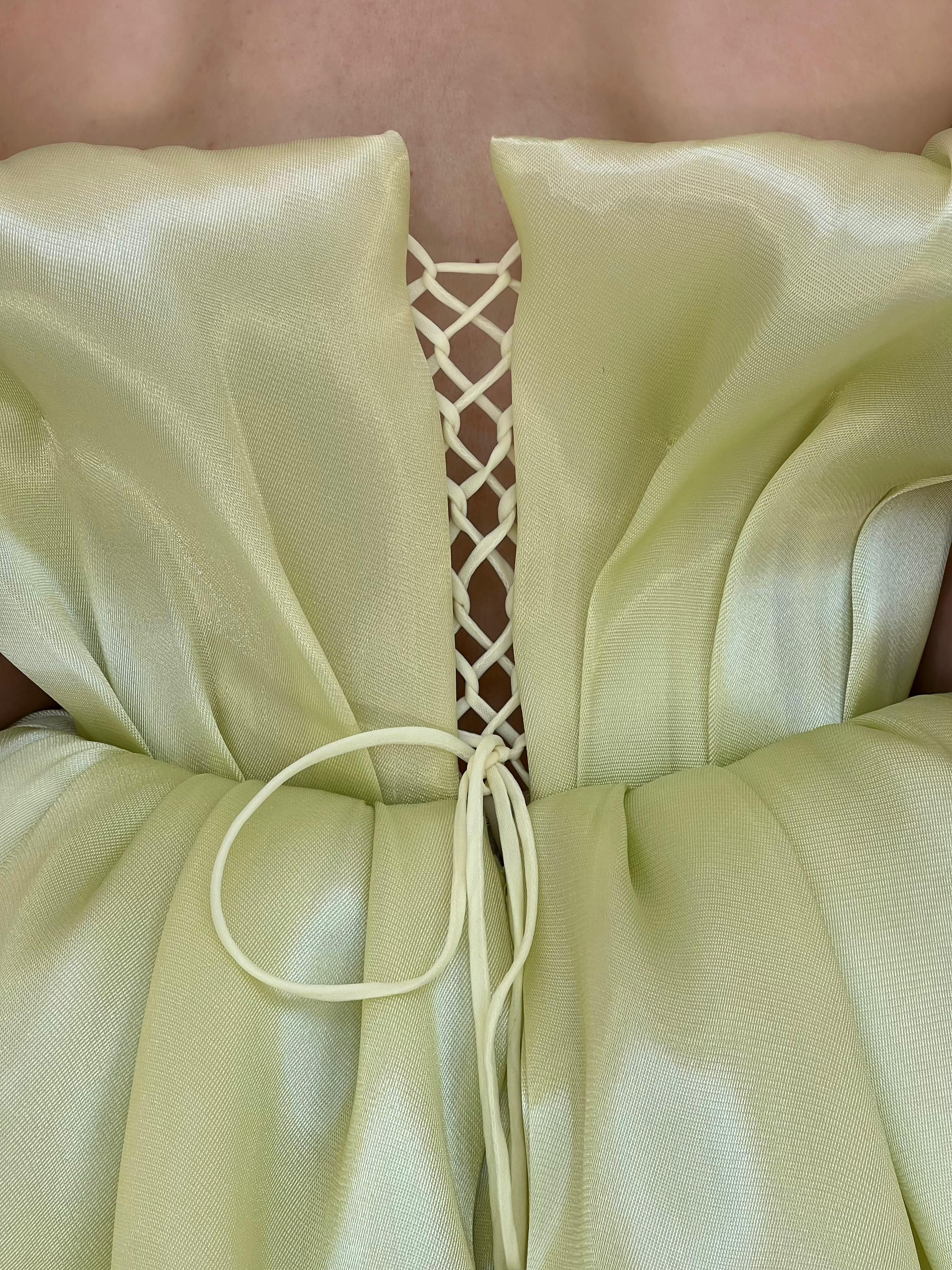 Yellow mini dress with ruffles