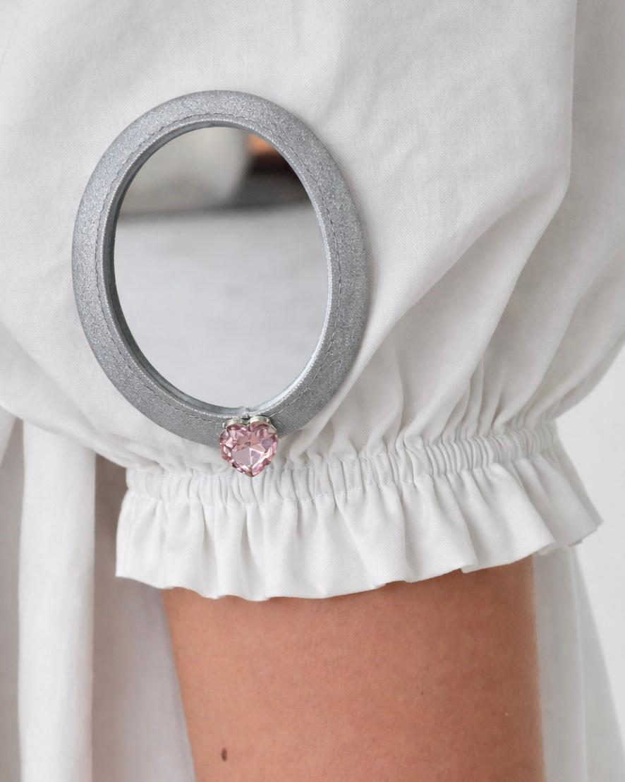 White mini dress with short sleeves and embroidered picture frames