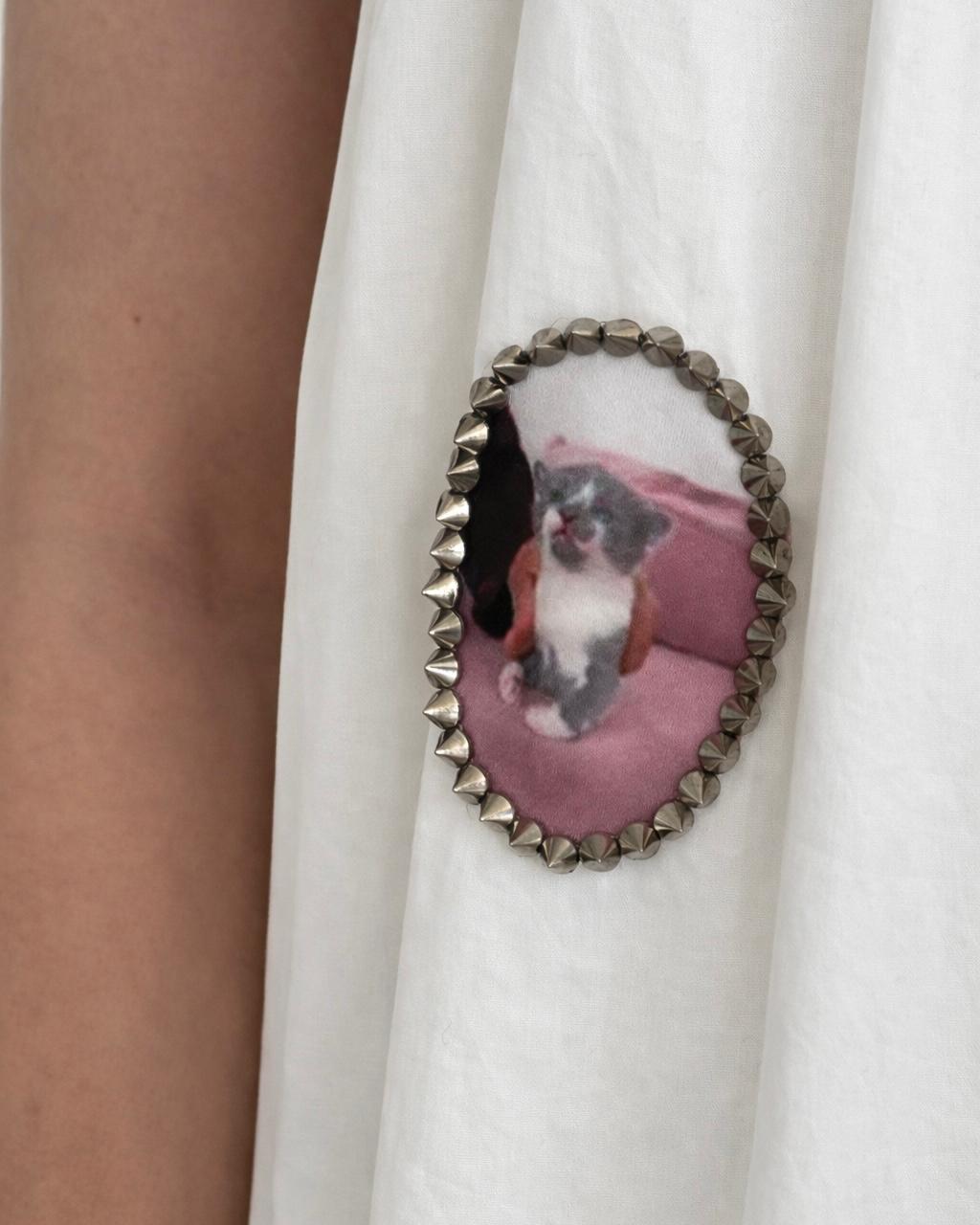 White mini dress with short sleeves and embroidered picture frames