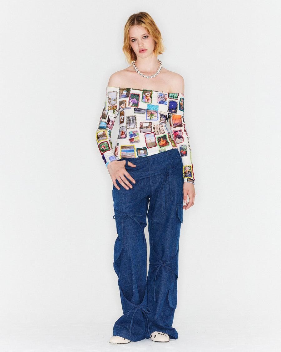 beaded top with embroidered pictures and blue navy denim bow pants