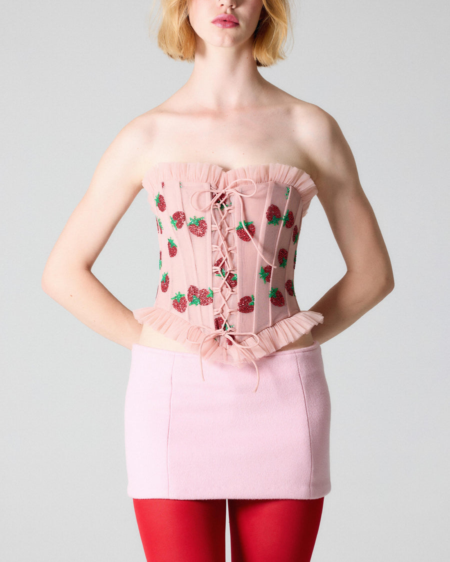 strawberry corset and pink wool skirt