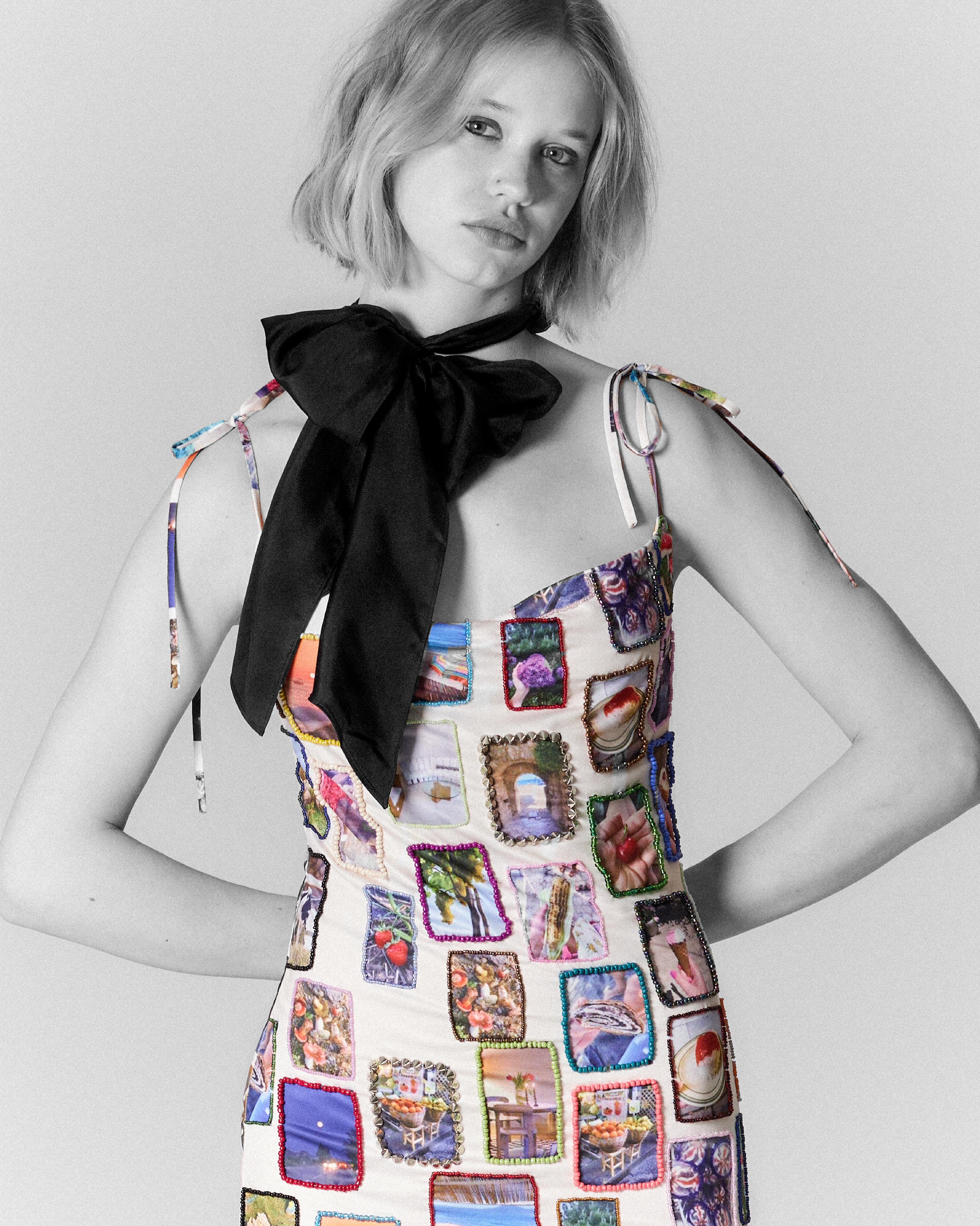 beaded dress with embroidered pictures and straps