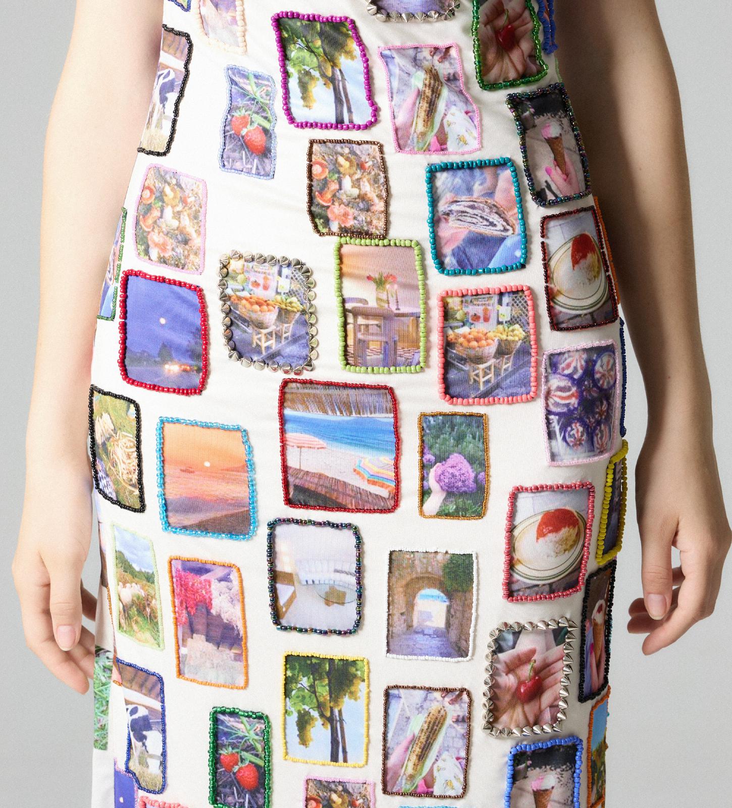 beaded dress with embroidered pictures and straps