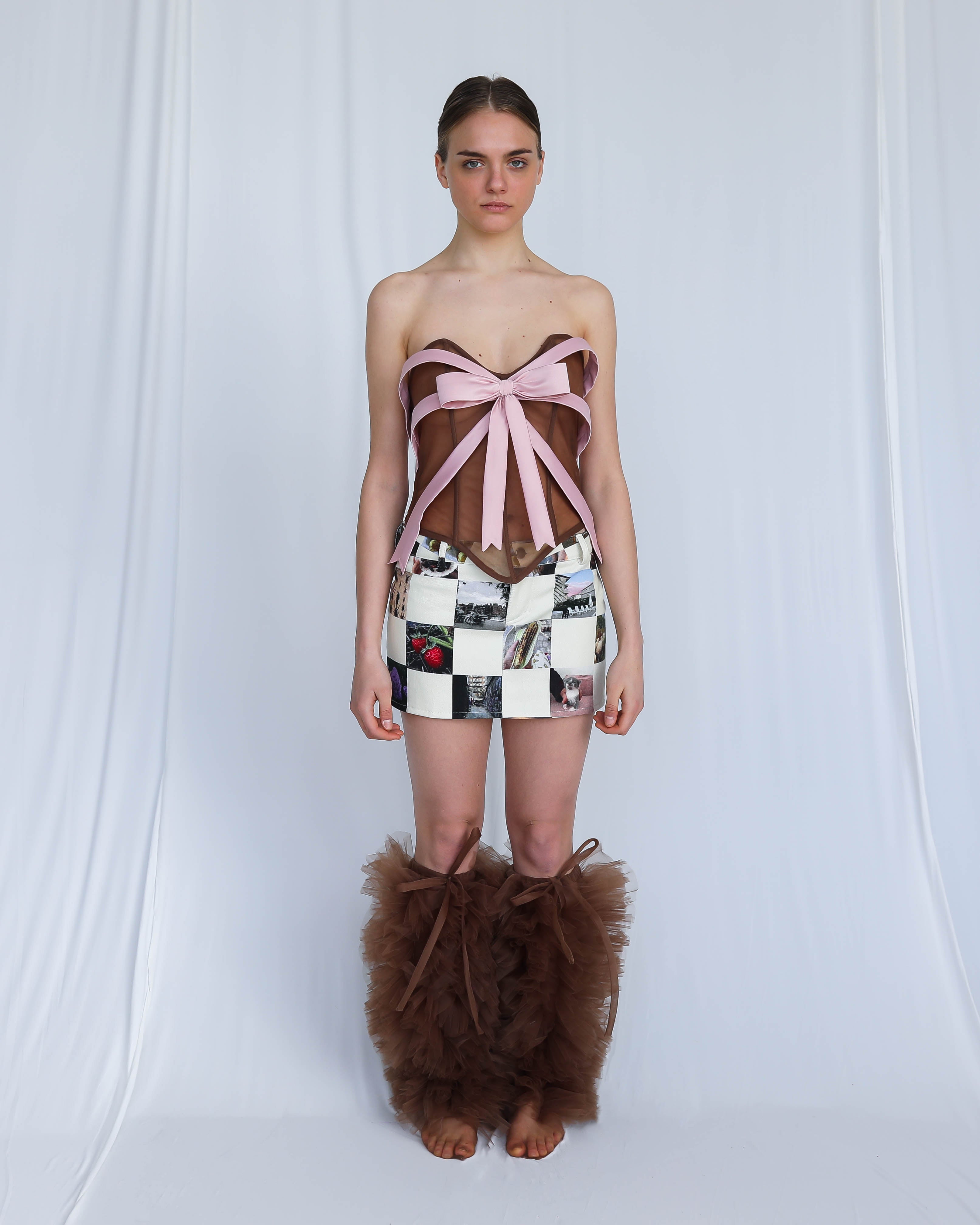 Brown corset with pink bow