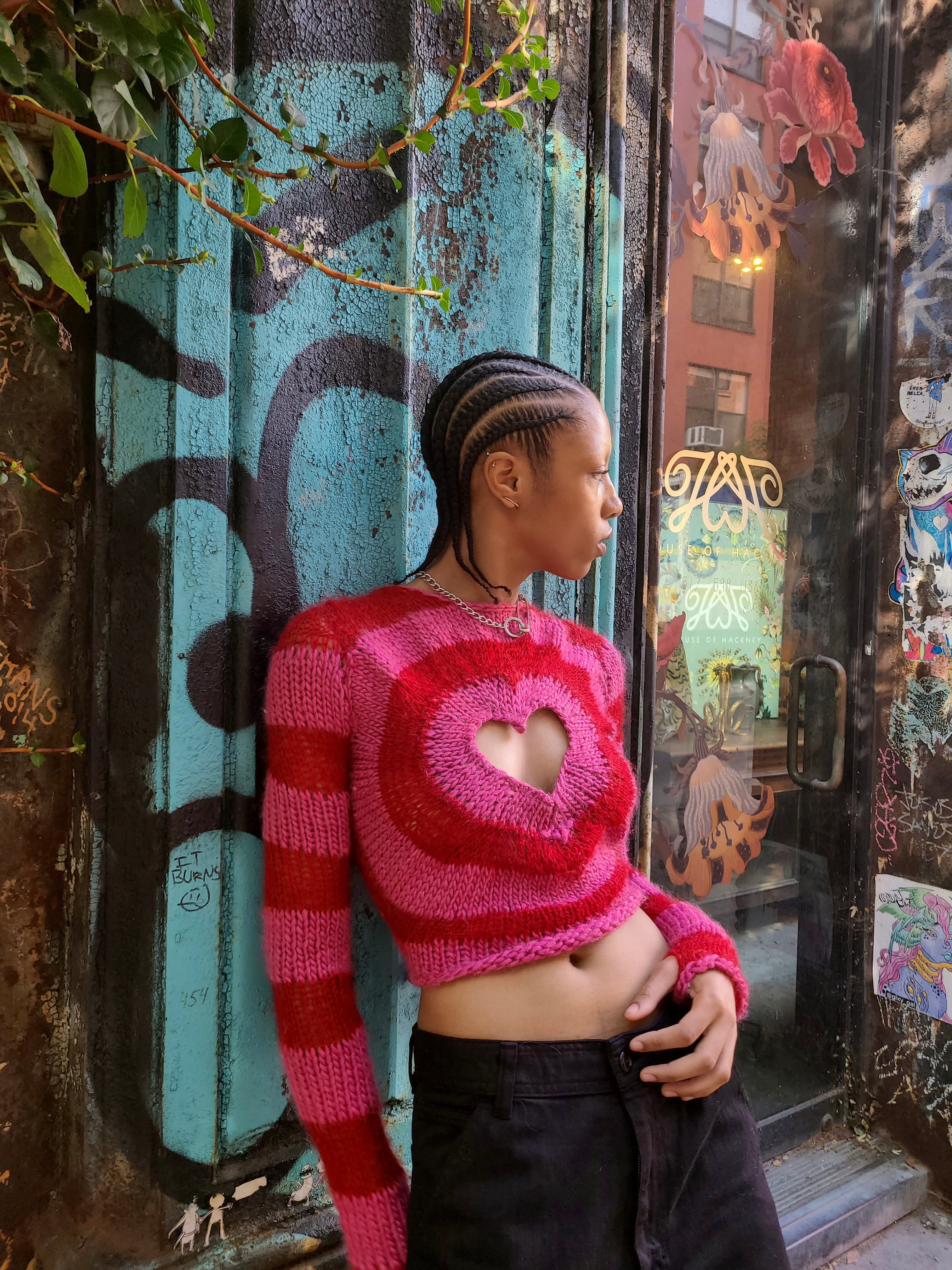 pink and red hand knitted heart sweater 